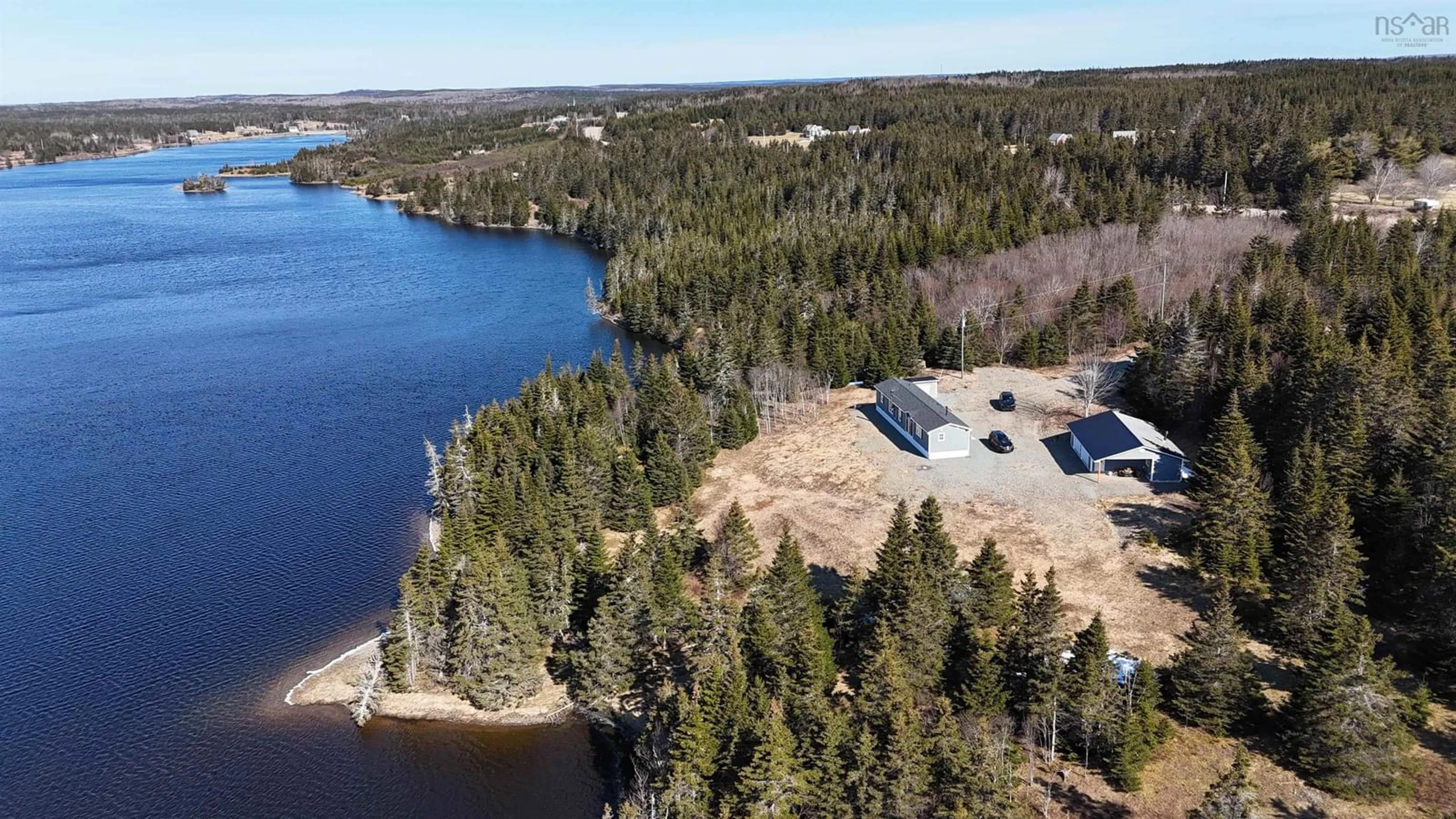 A pic from outside/outdoor area/front of a property/back of a property/a pic from drone, water/lake/river/ocean view for 290 Eastside Grand River, Grand River Nova Scotia B0E 1M0