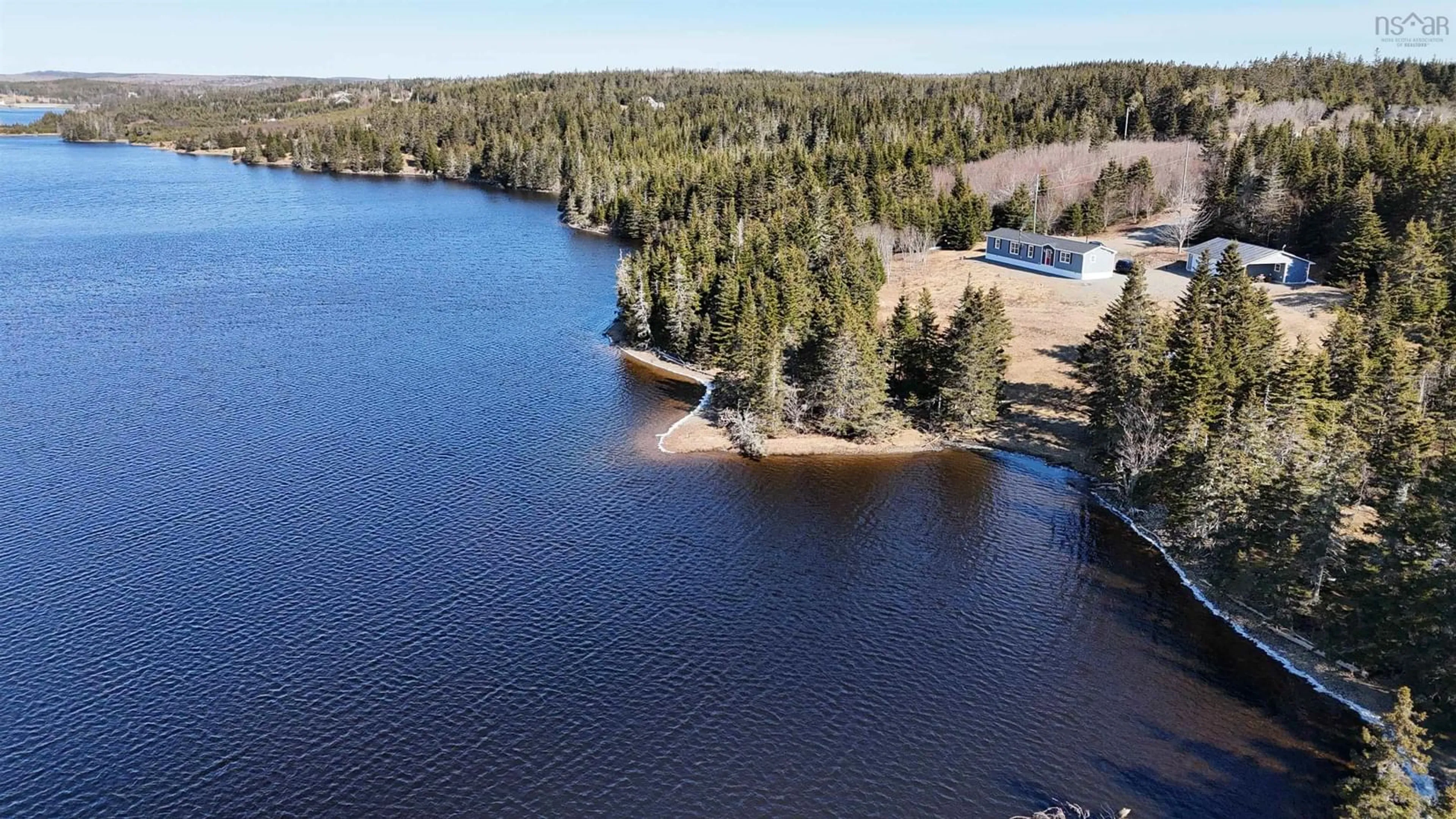 A pic from outside/outdoor area/front of a property/back of a property/a pic from drone, water/lake/river/ocean view for 290 Eastside Grand River, Grand River Nova Scotia B0E 1M0