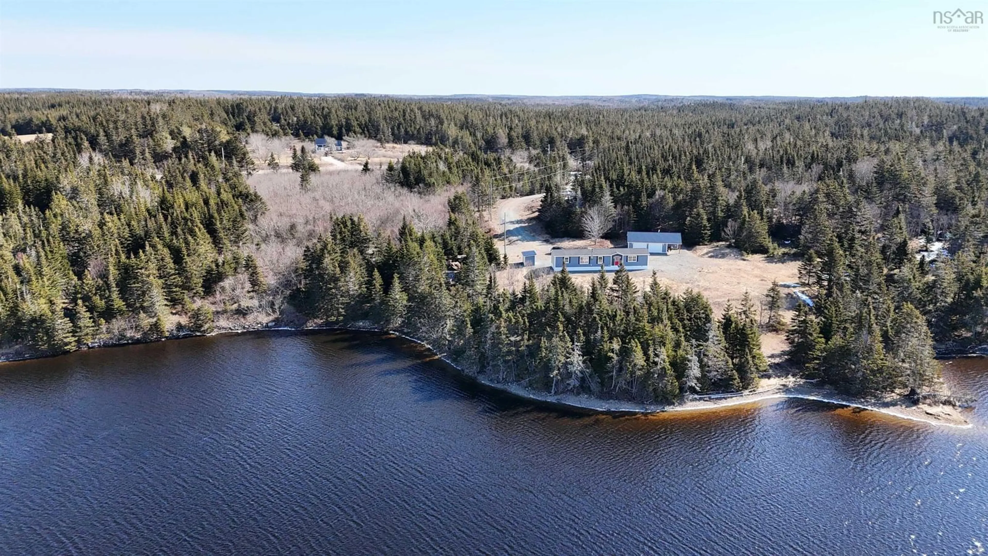 A pic from outside/outdoor area/front of a property/back of a property/a pic from drone, water/lake/river/ocean view for 290 Eastside Grand River, Grand River Nova Scotia B0E 1M0