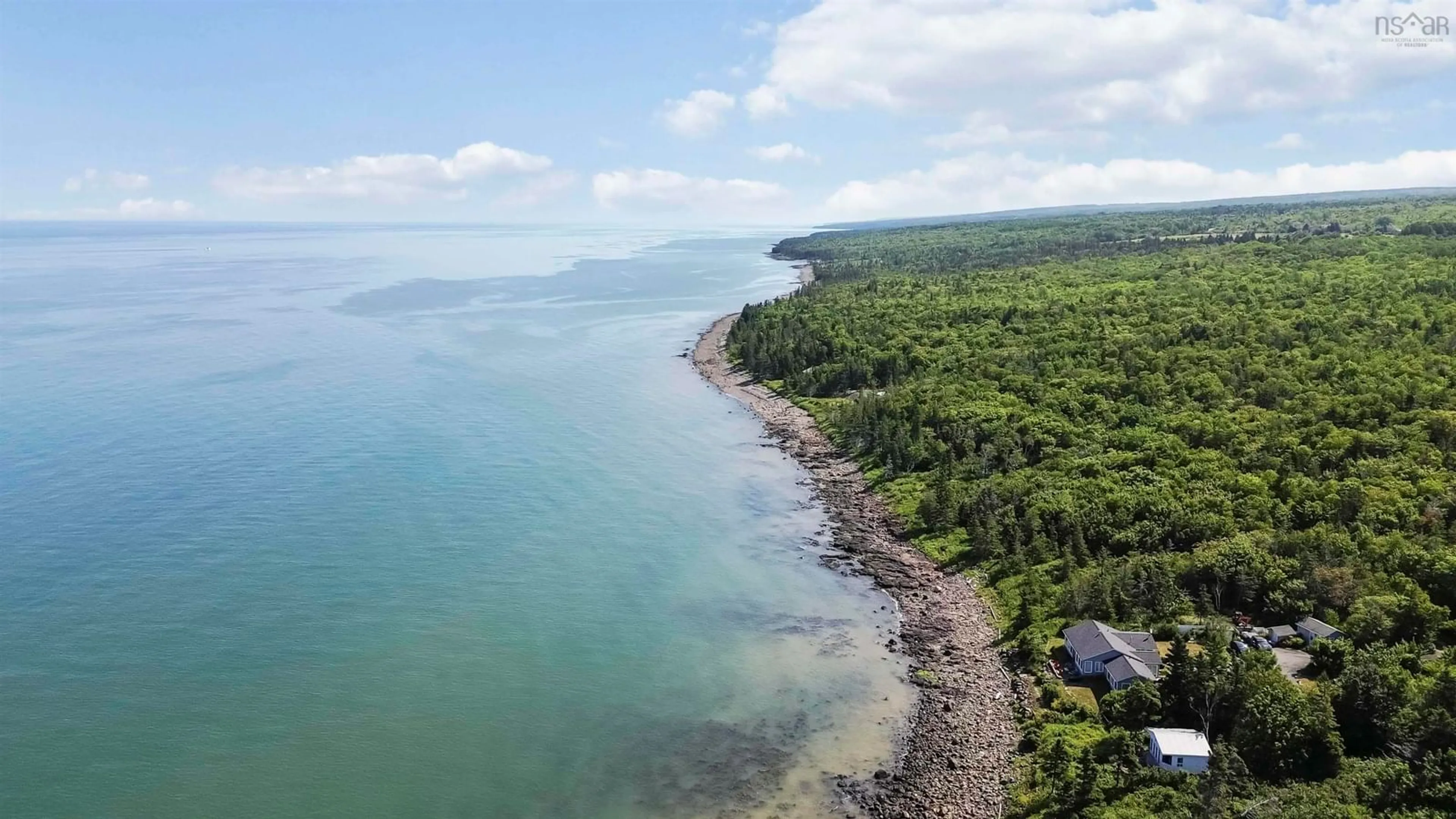 A pic from outside/outdoor area/front of a property/back of a property/a pic from drone, water/lake/river/ocean view for 51 Sunset Ave, Phinneys Cove Nova Scotia B0S 1L0