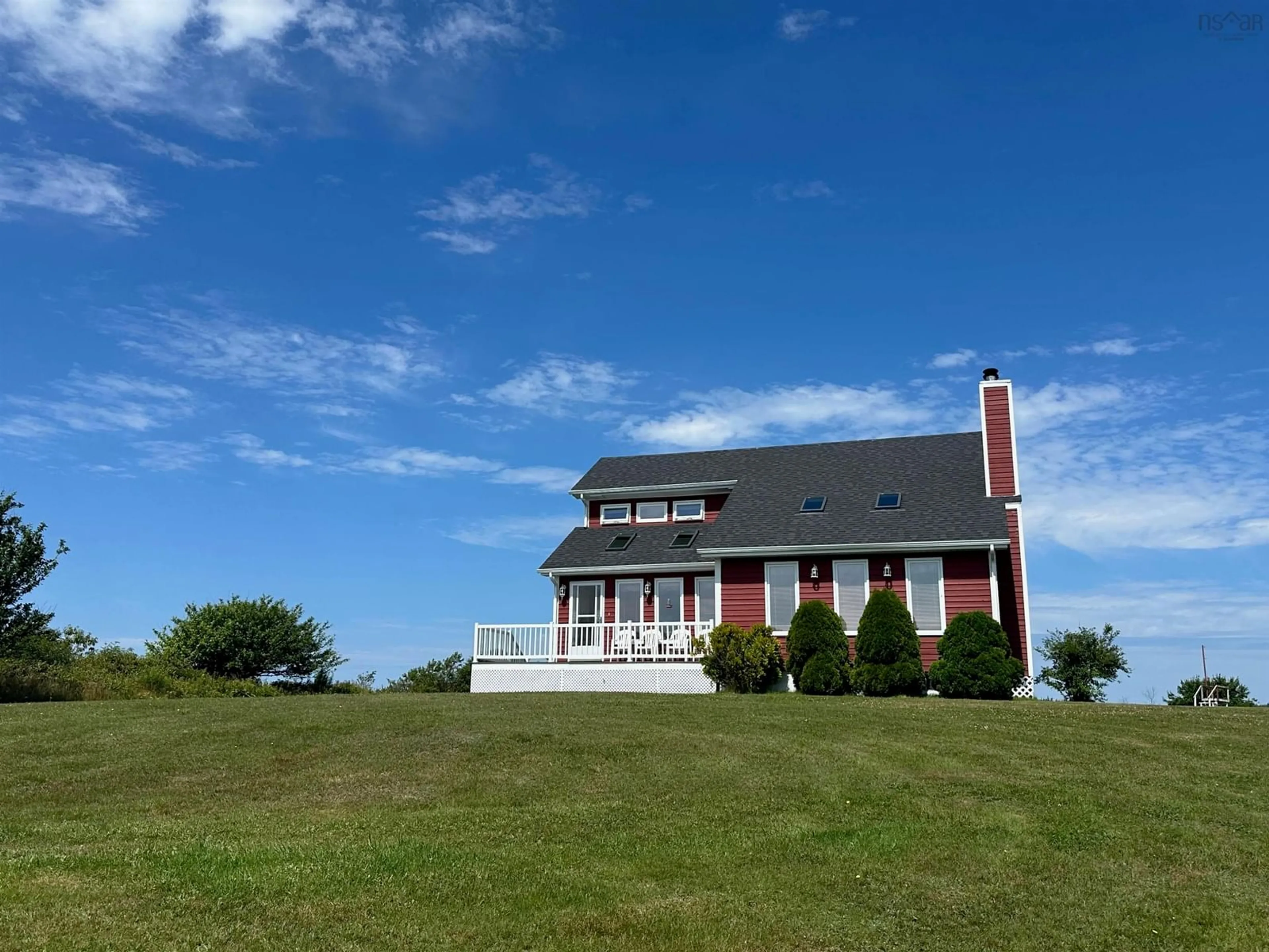 A pic from outside/outdoor area/front of a property/back of a property/a pic from drone, water/lake/river/ocean view for 25 North Road, Charlos Cove Nova Scotia B0H 1T0