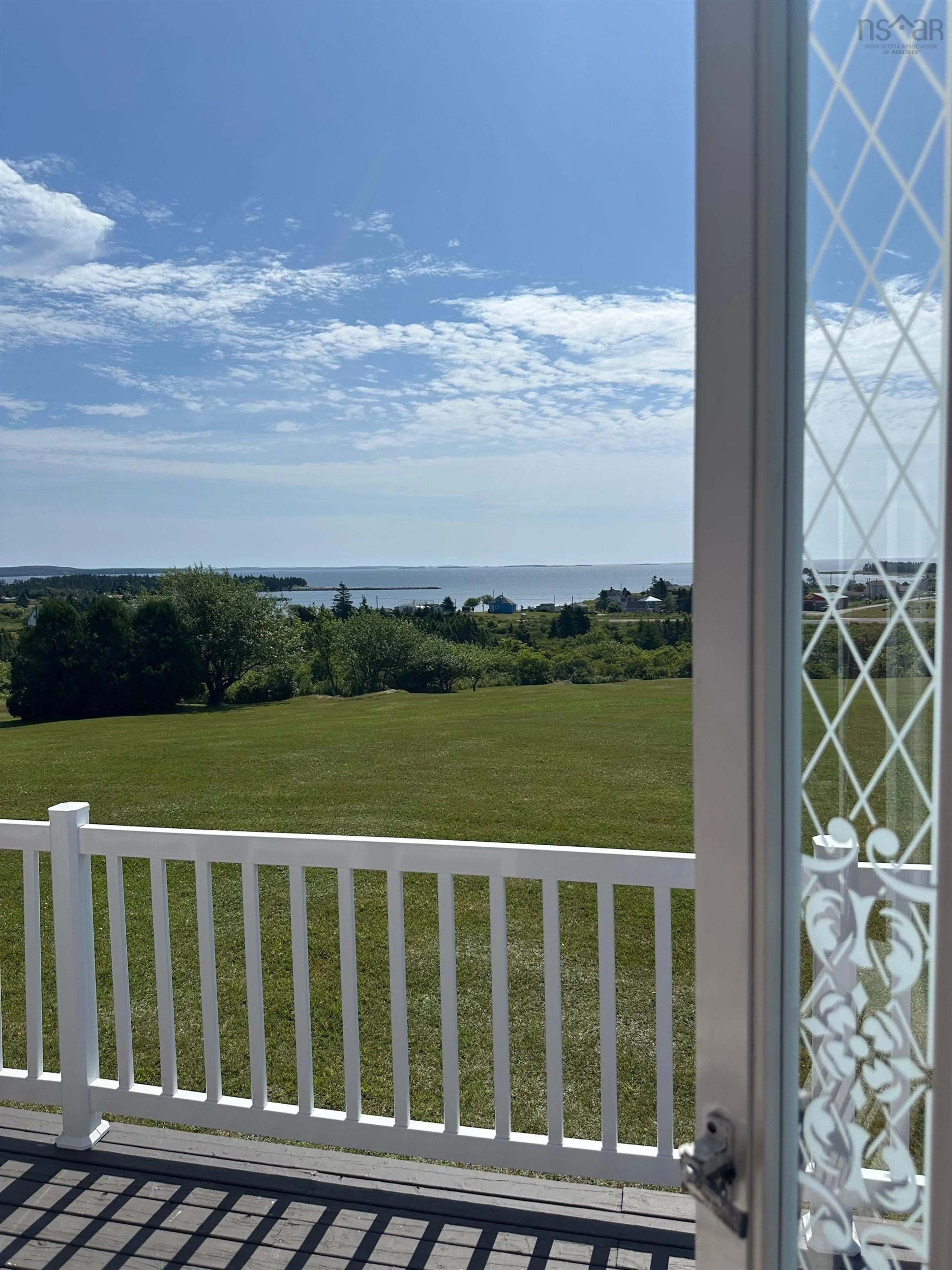 A pic from outside/outdoor area/front of a property/back of a property/a pic from drone, water/lake/river/ocean view for 25 North Road, Charlos Cove Nova Scotia B0H 1T0