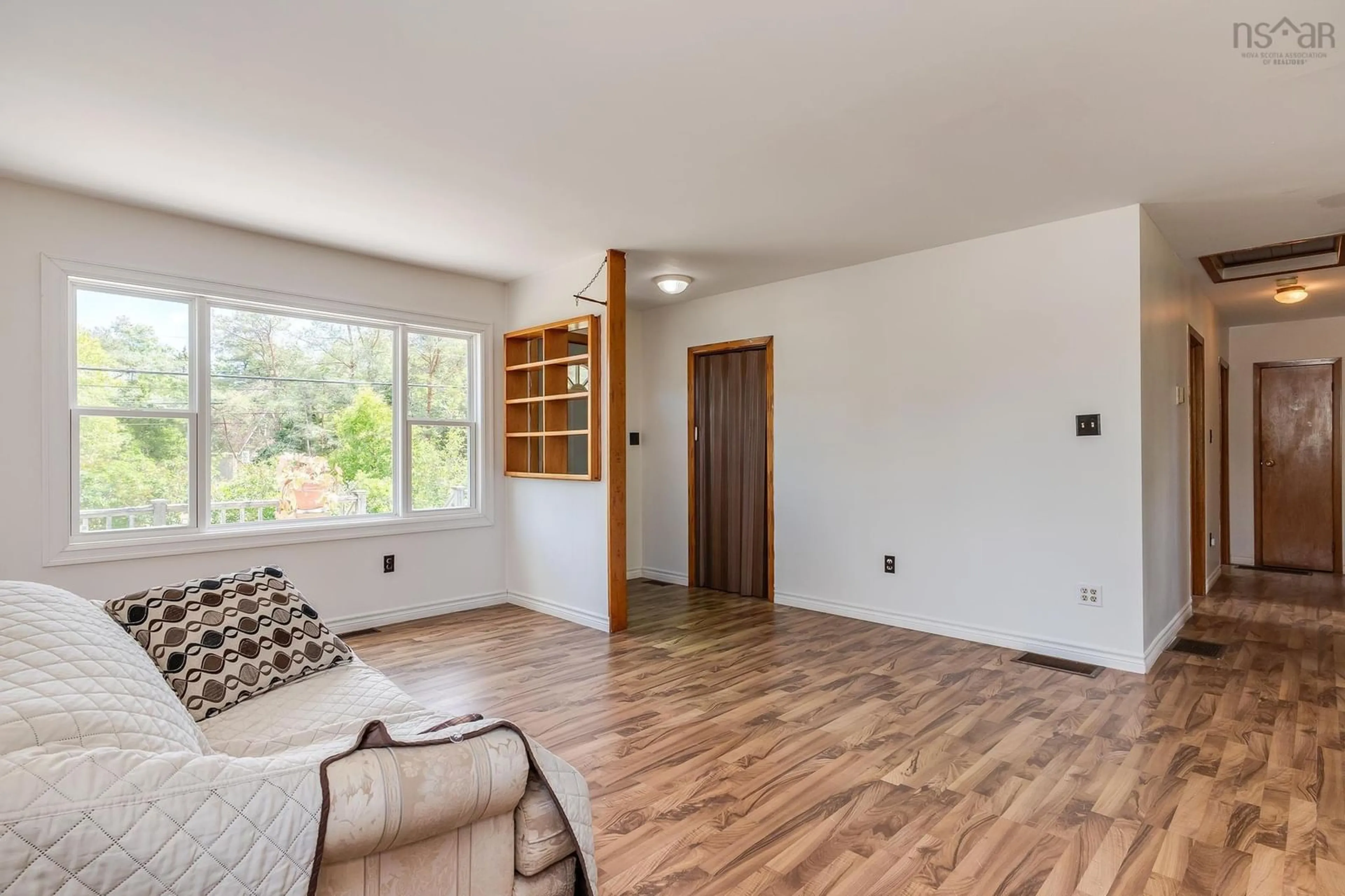Living room with furniture, wood/laminate floor for 3148 Highway 3, East Chester Nova Scotia B0J 1J0