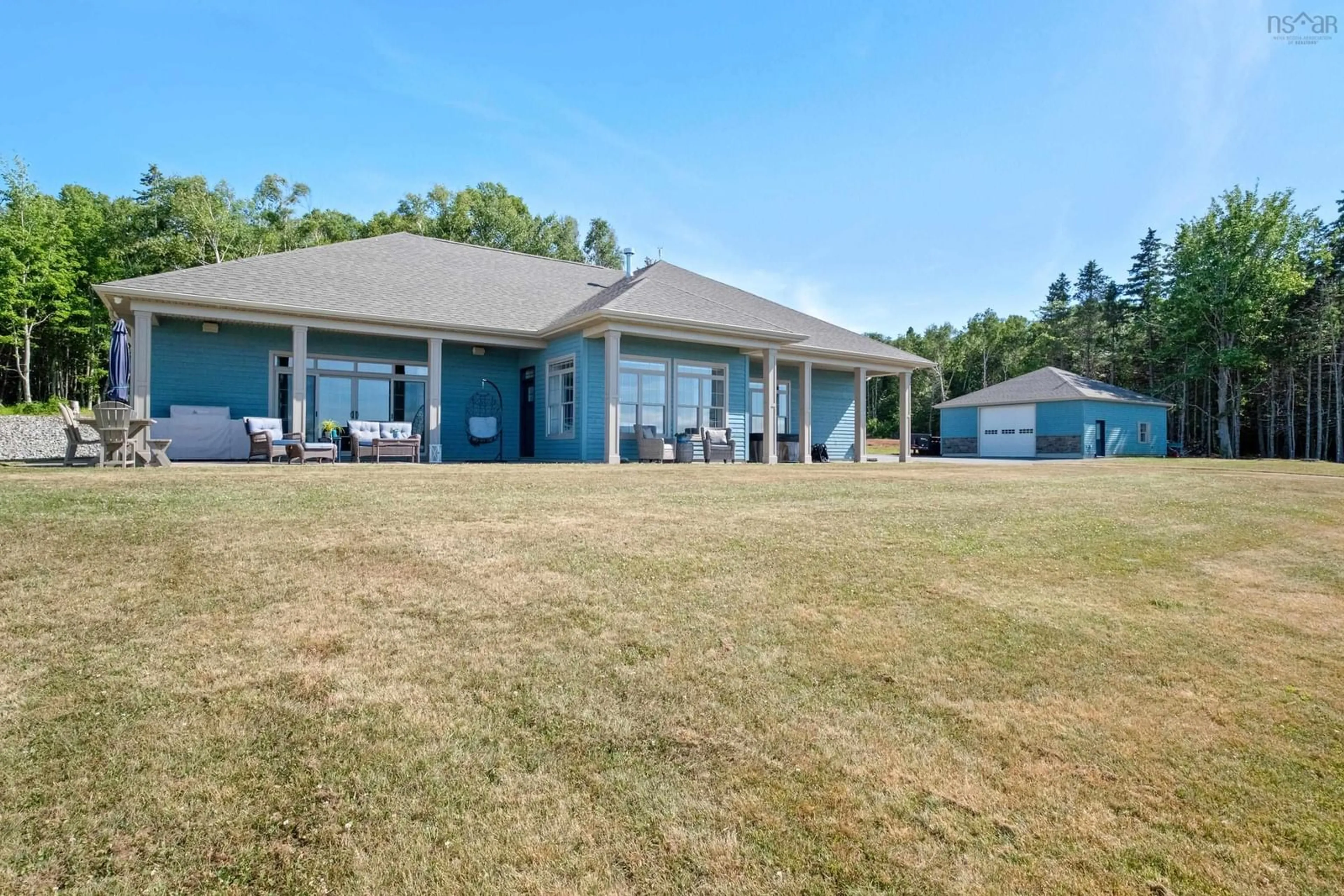 A pic from outside/outdoor area/front of a property/back of a property/a pic from drone, water/lake/river/ocean view for 5030 Grand Narrows Highway, Beaver Cove Nova Scotia B1T 1P1