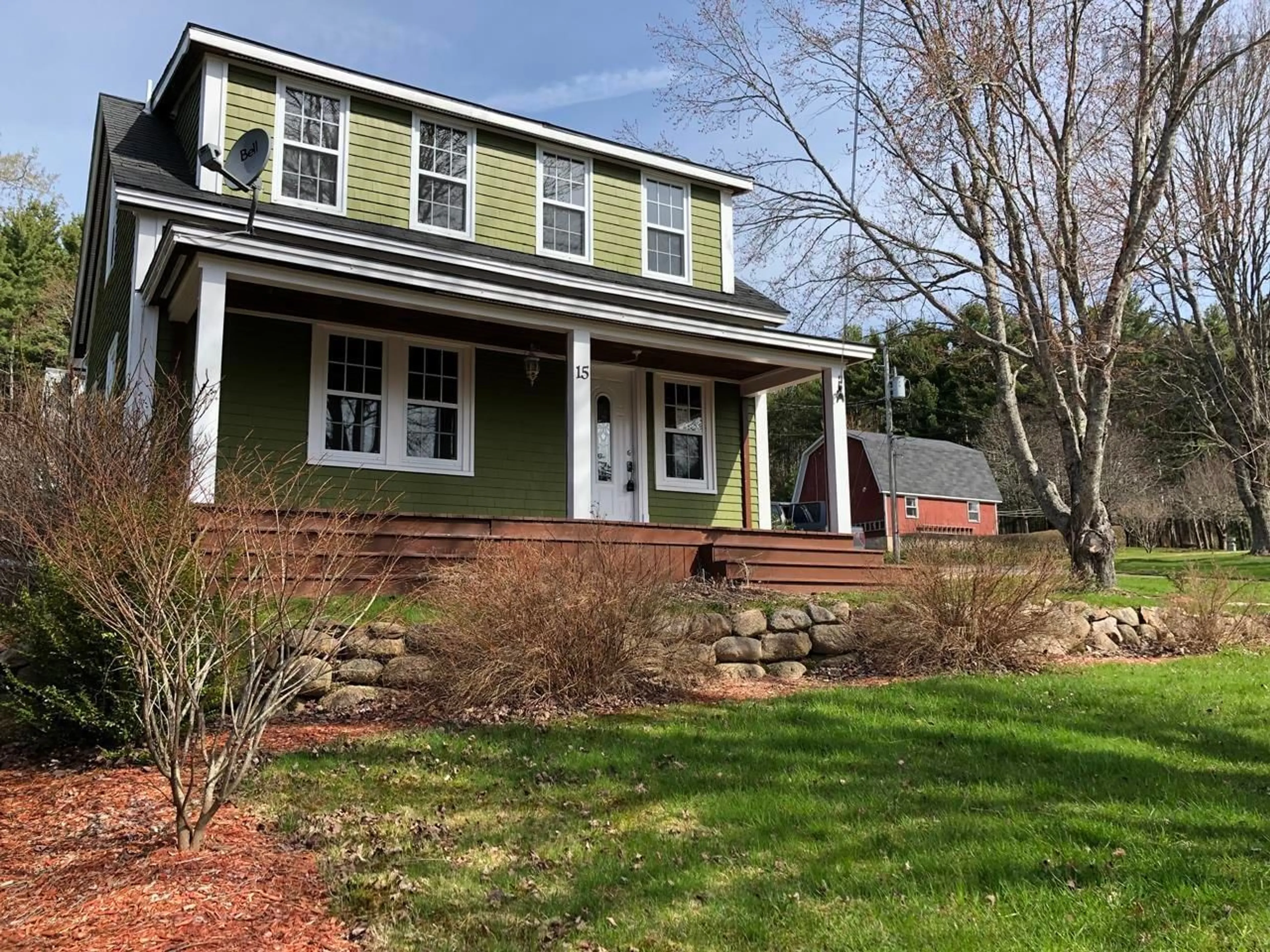 Home with vinyl exterior material, street for 15 Elizabeth Ave, New Germany Nova Scotia B0R 1E0