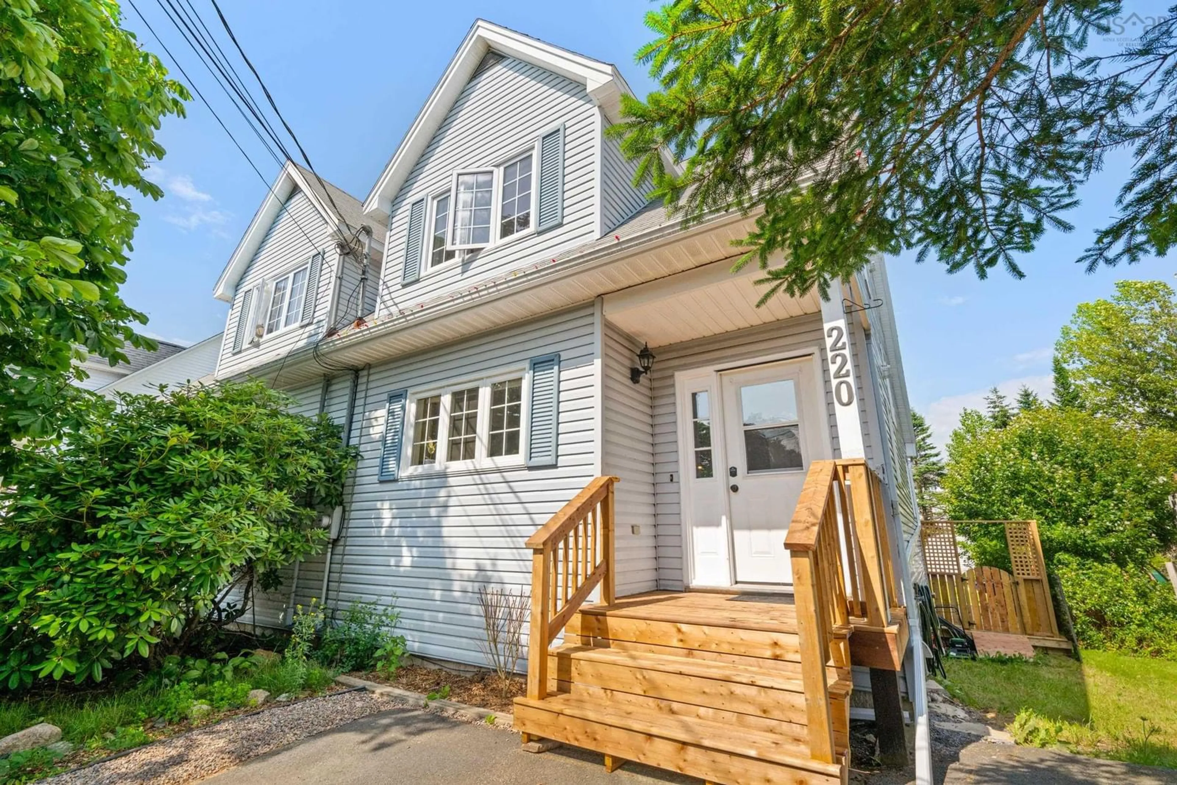 Home with vinyl exterior material, street for 220 Greenwood Ave, Timberlea Nova Scotia B3T 1H8