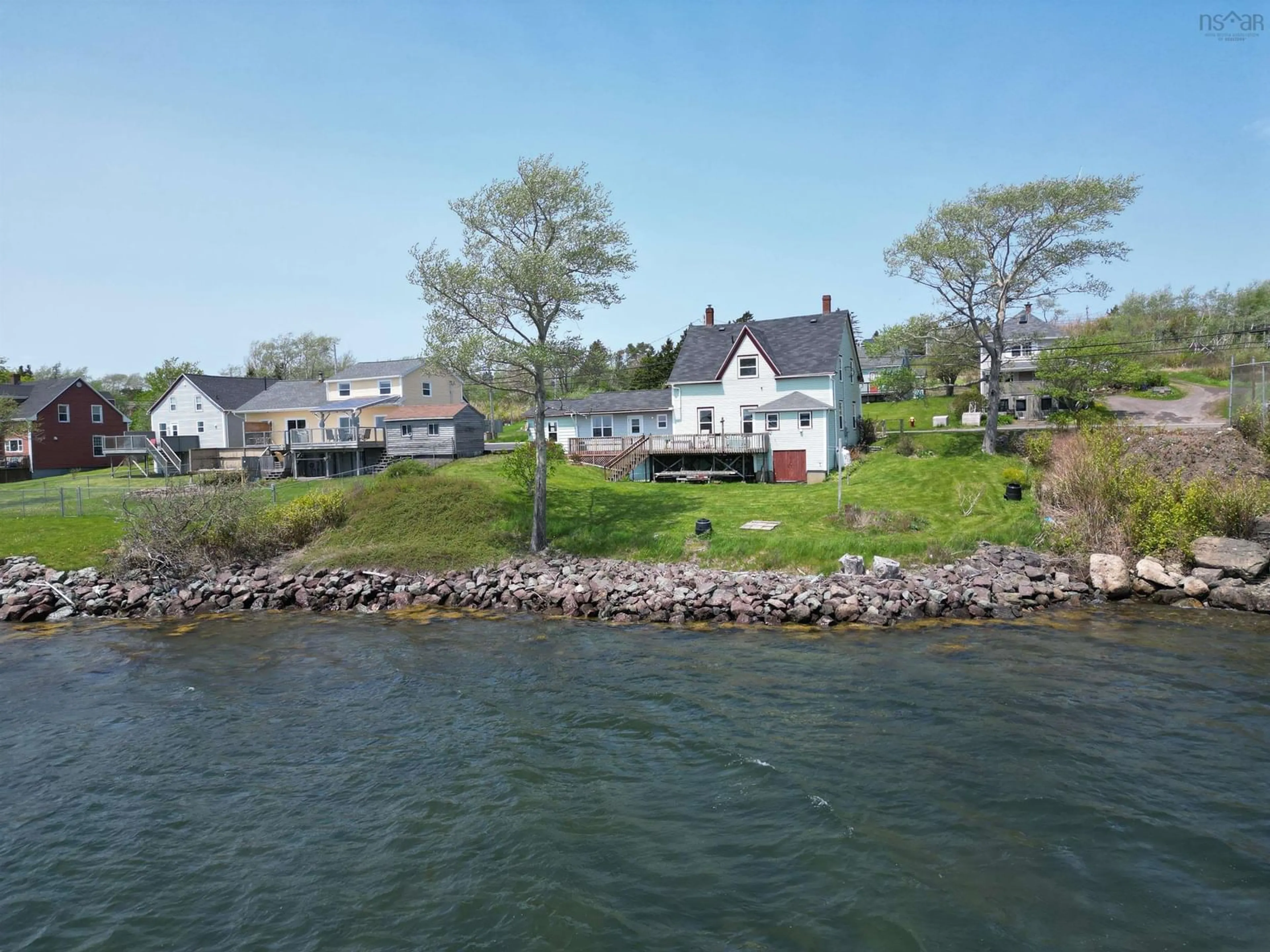 A pic from outside/outdoor area/front of a property/back of a property/a pic from drone, water/lake/river/ocean view for 740 Veterans Memorial Dr, Arichat Nova Scotia B0E 1A0