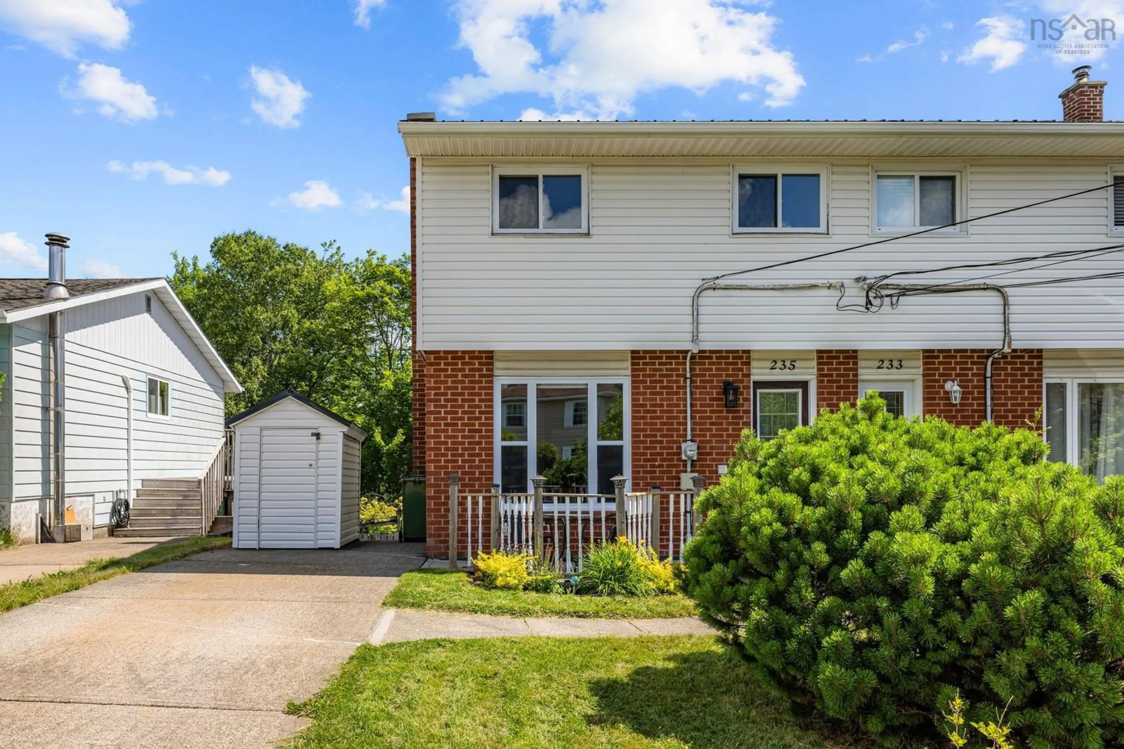 Home with vinyl exterior material, street for 235 Poplar Dr, Cole Harbour Nova Scotia B2W 4K6