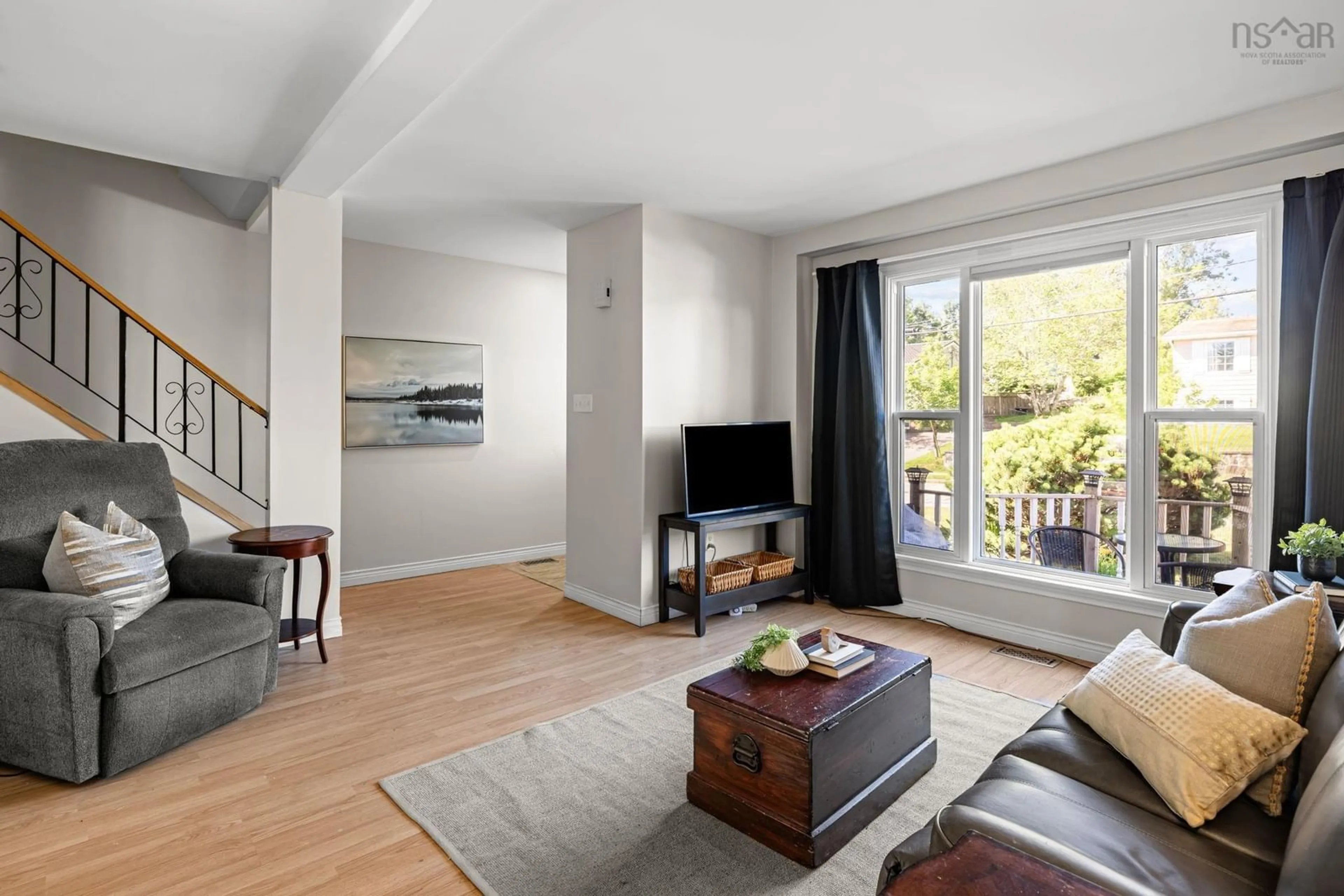 Living room with furniture, wood/laminate floor for 235 Poplar Dr, Cole Harbour Nova Scotia B2W 4K6