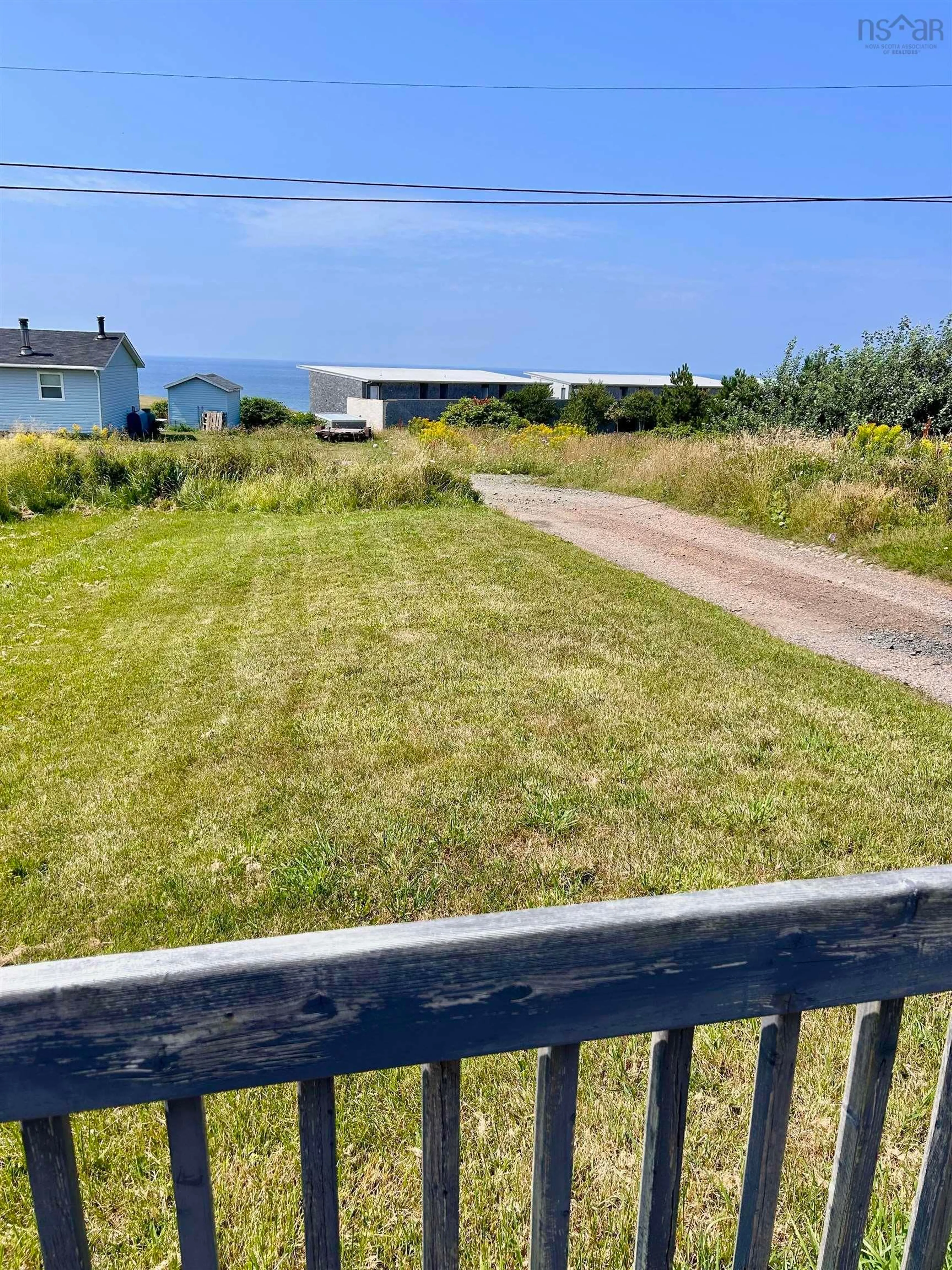 A pic from outside/outdoor area/front of a property/back of a property/a pic from drone, water/lake/river/ocean view for 15921 Central Ave, Inverness Nova Scotia B0E 1N0
