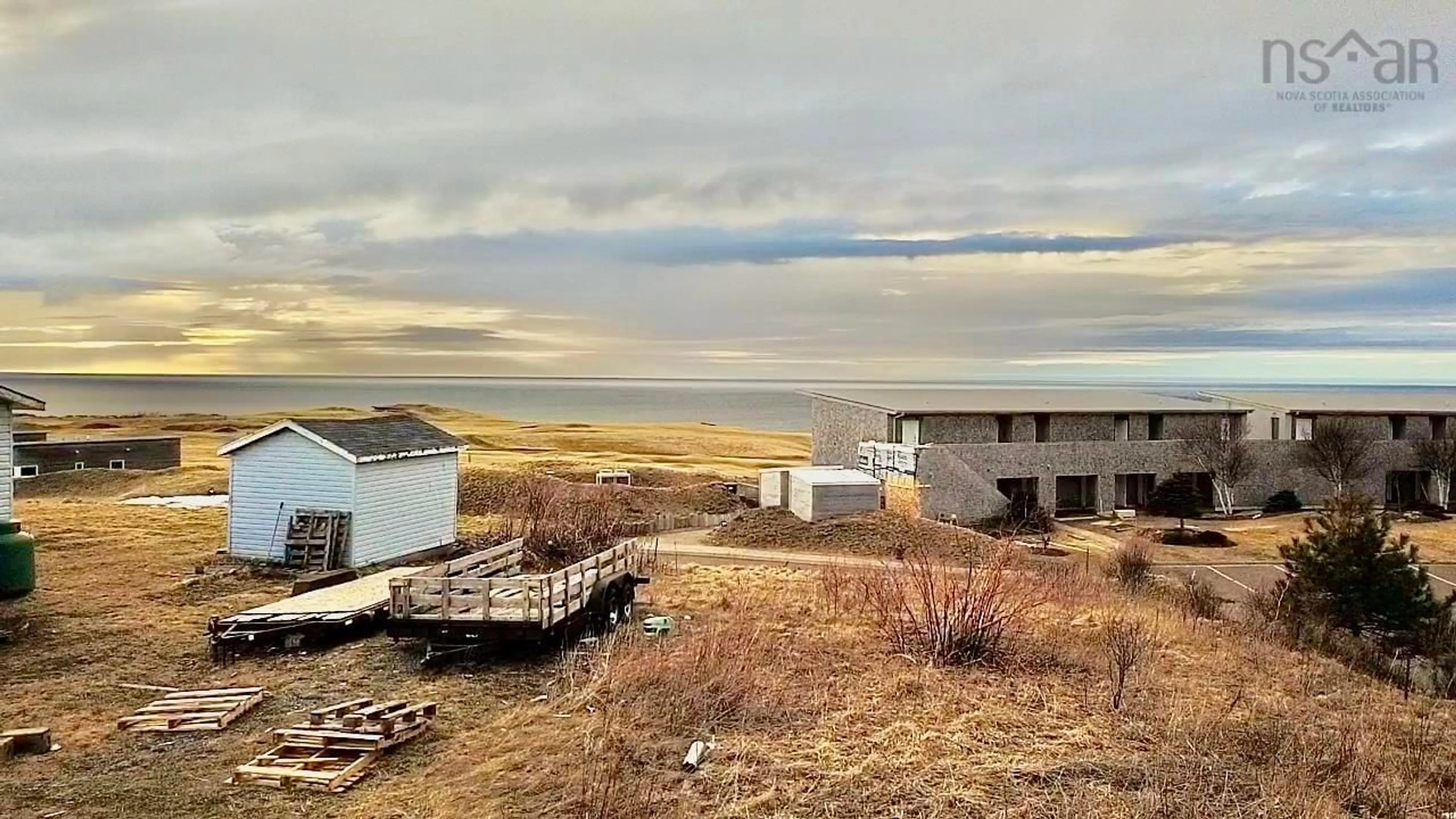 A pic from outside/outdoor area/front of a property/back of a property/a pic from drone, water/lake/river/ocean view for 15921 Central Ave, Inverness Nova Scotia B0E 1N0
