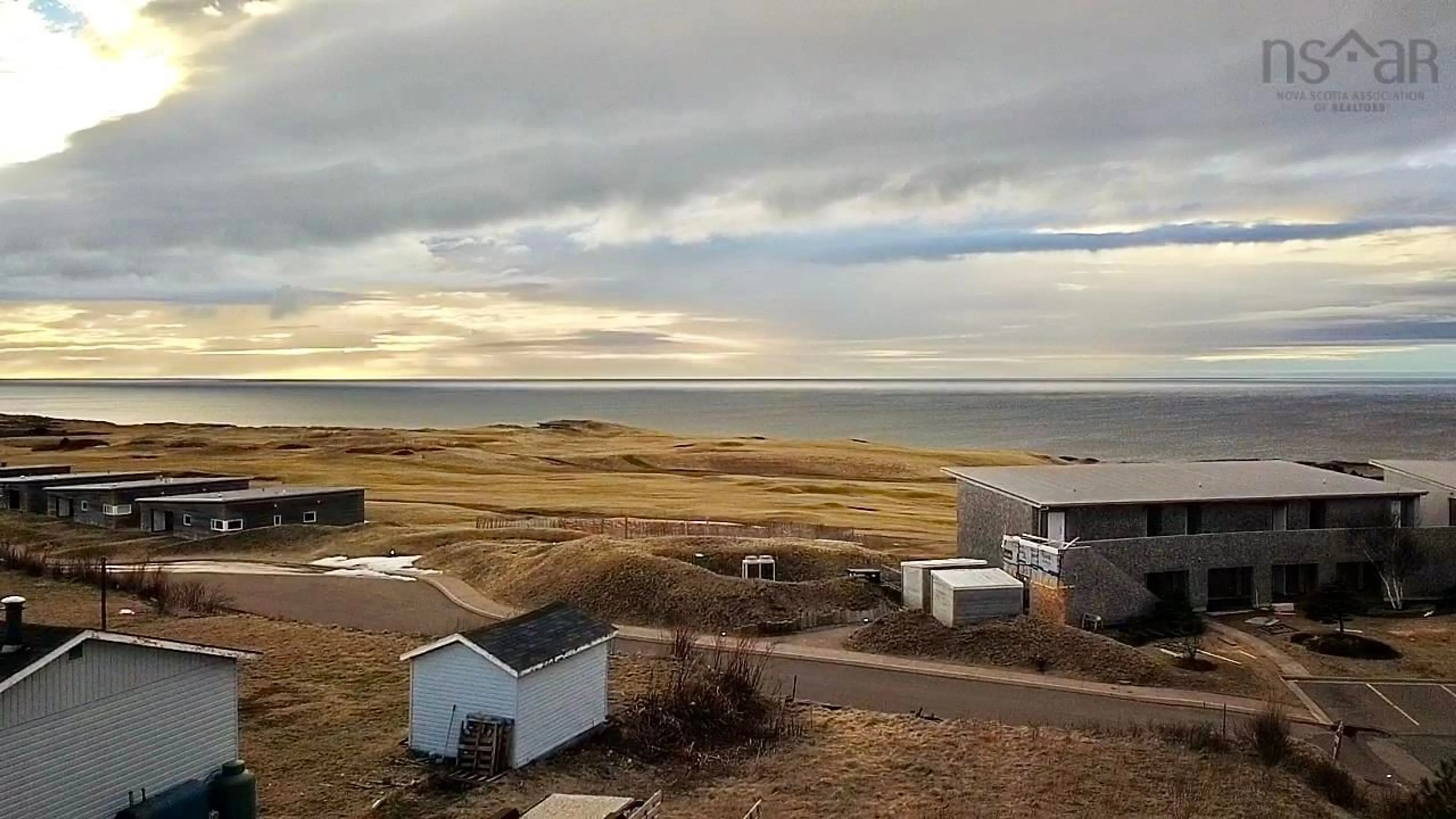 A pic from outside/outdoor area/front of a property/back of a property/a pic from drone, water/lake/river/ocean view for 15921 Central Ave, Inverness Nova Scotia B0E 1N0