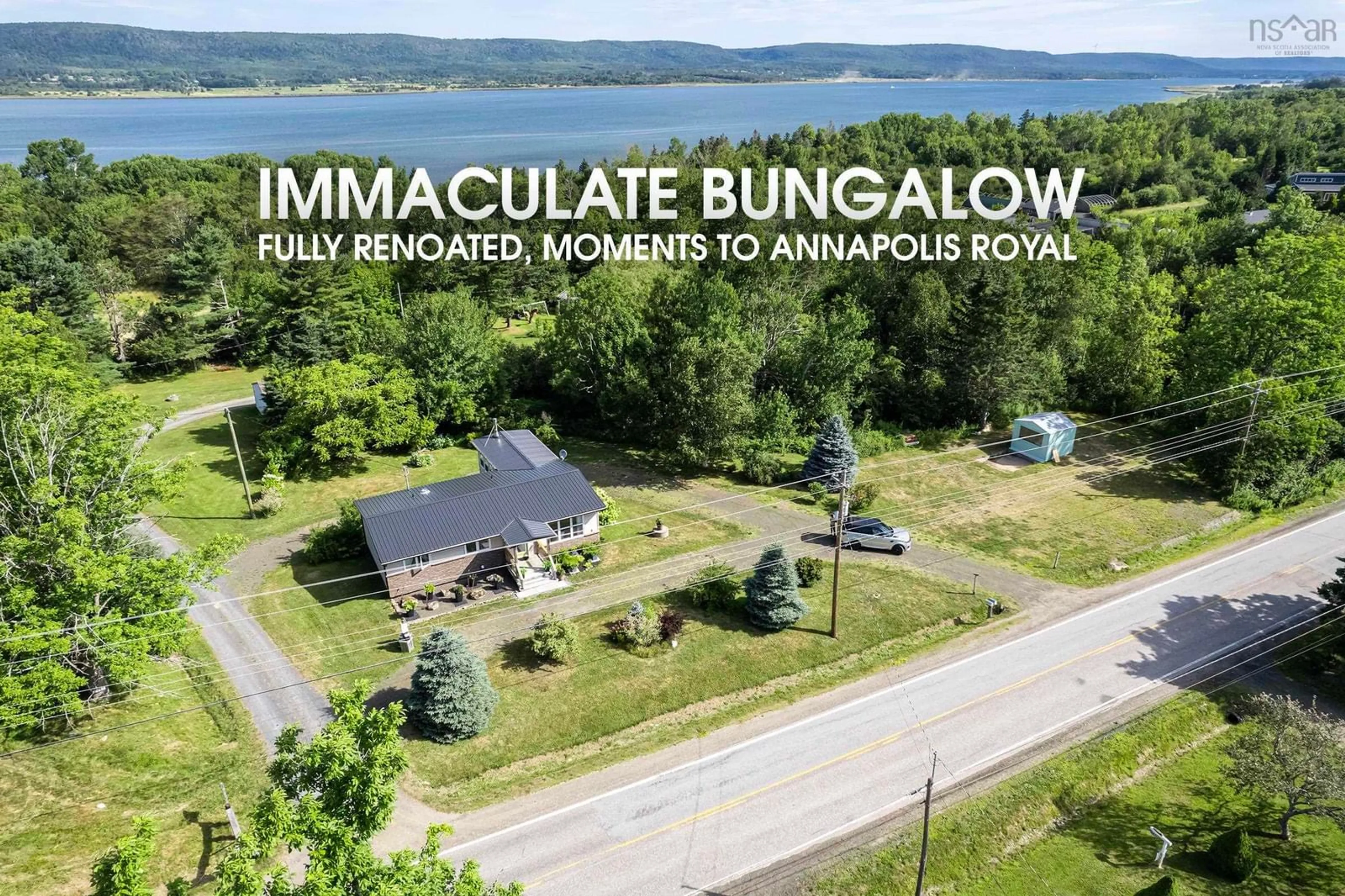 A pic from outside/outdoor area/front of a property/back of a property/a pic from drone, unknown for 2743 Highway 1, Upper Clements Nova Scotia B0S 1A0