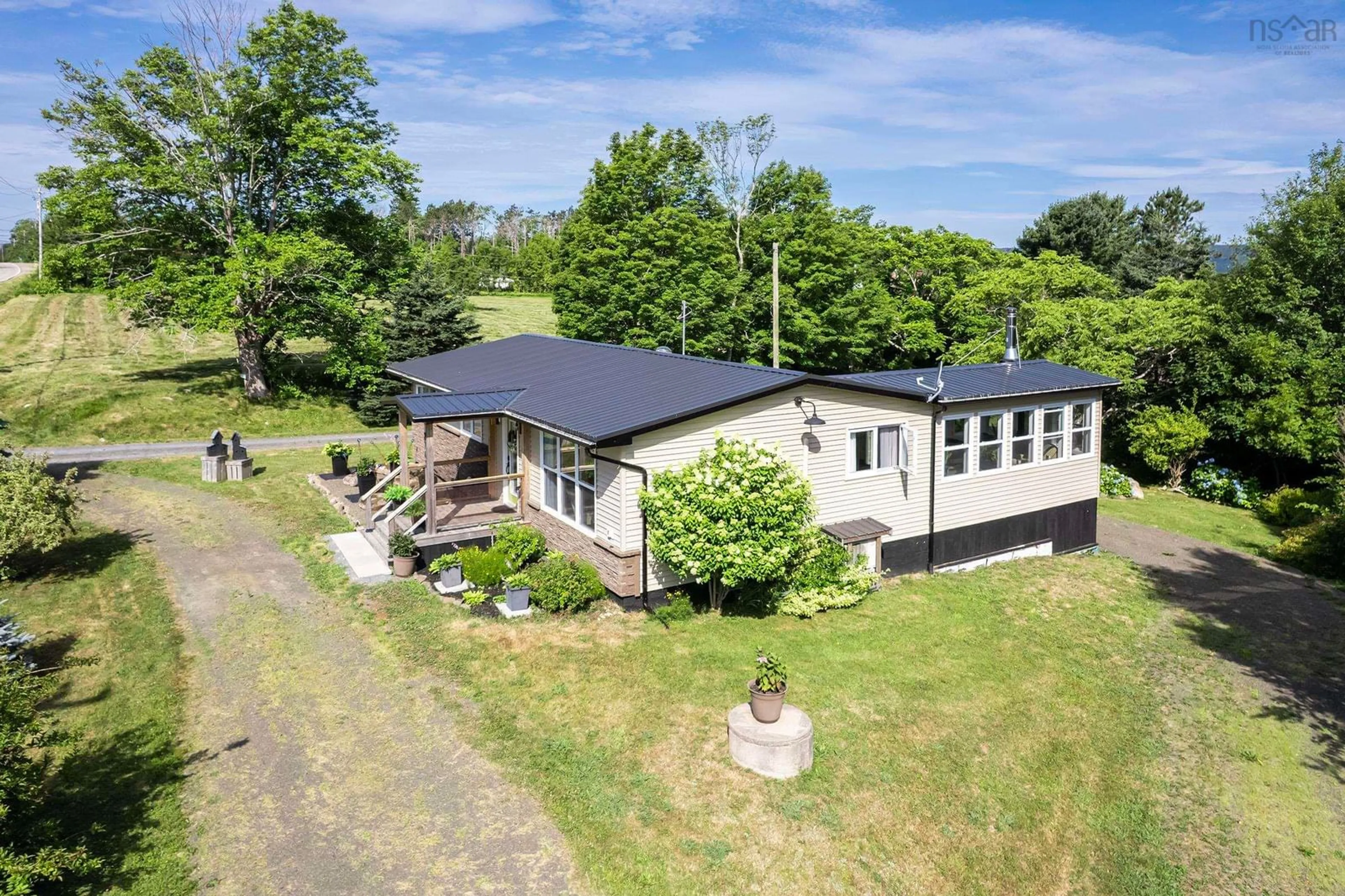 A pic from outside/outdoor area/front of a property/back of a property/a pic from drone, building for 2743 Highway 1, Upper Clements Nova Scotia B0S 1A0