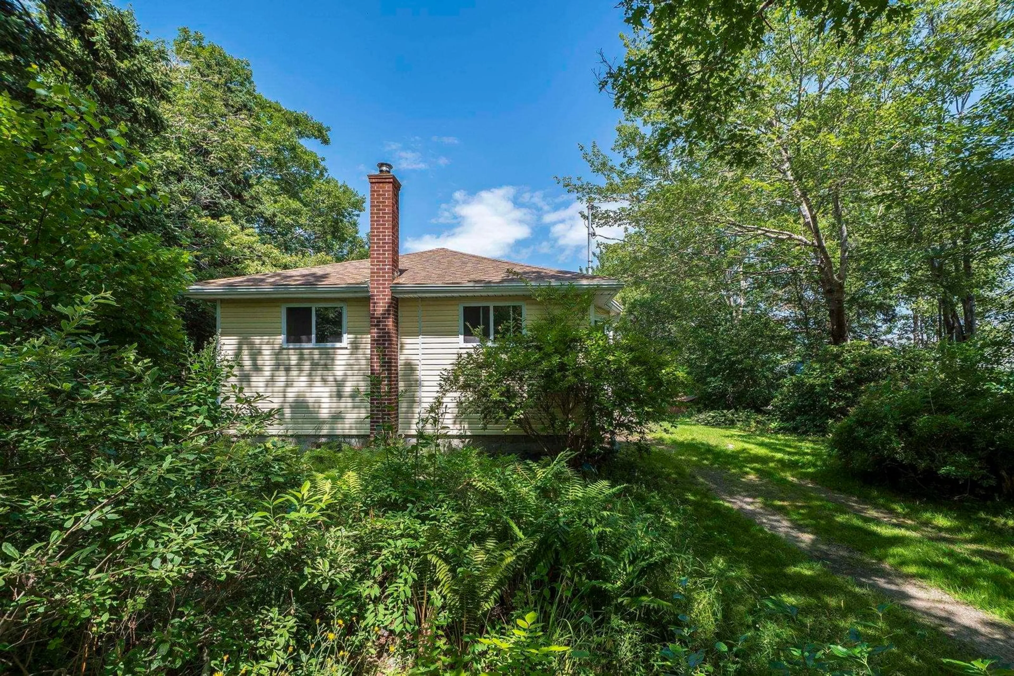 A pic from outside/outdoor area/front of a property/back of a property/a pic from drone, unknown for 1315 Highway 329, Mill Cove Nova Scotia B0J 1T0