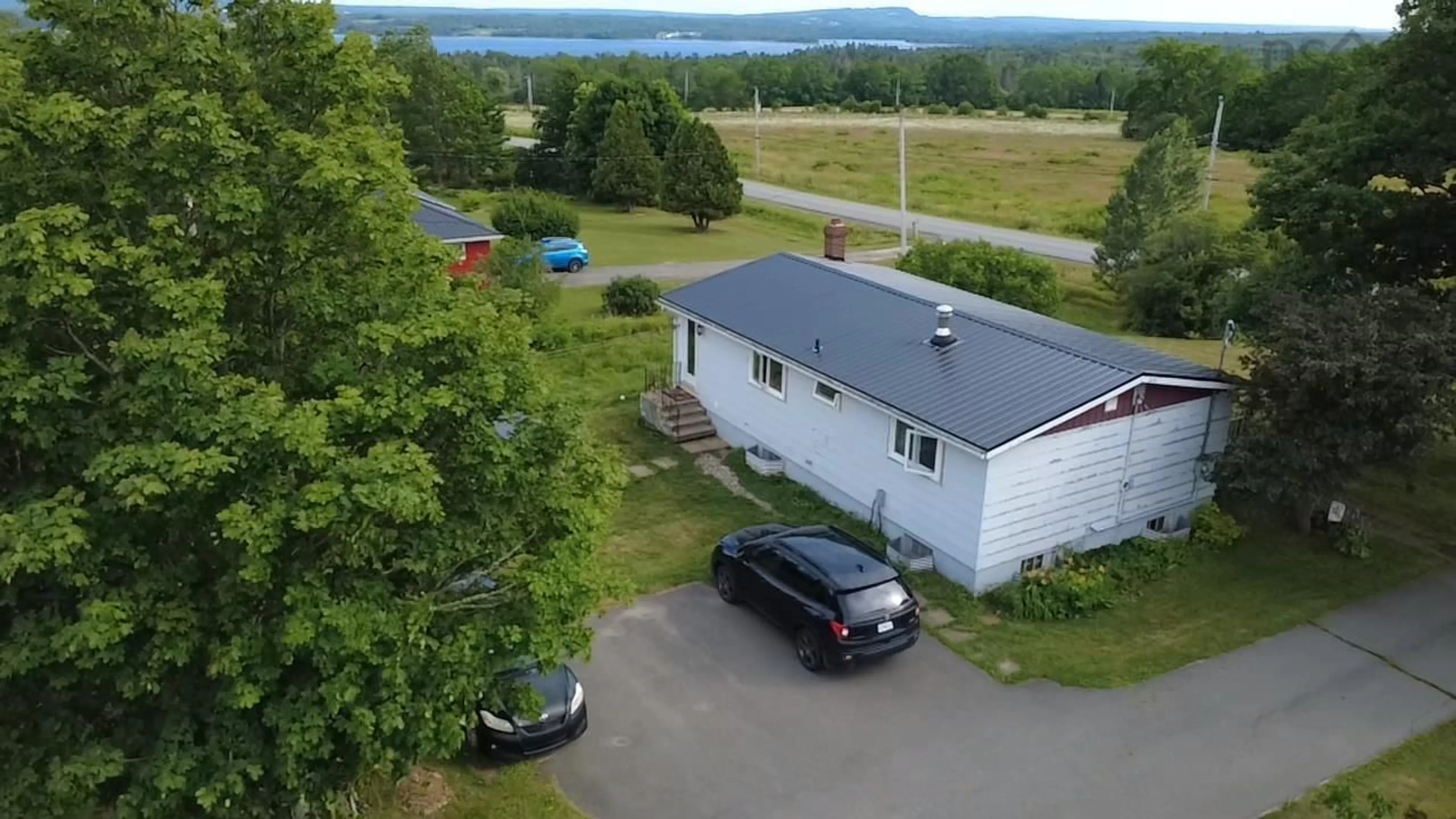 A pic from outside/outdoor area/front of a property/back of a property/a pic from drone, water/lake/river/ocean view for 256 Scotch Hill Rd, Lyons Brook Nova Scotia B0K 1H0
