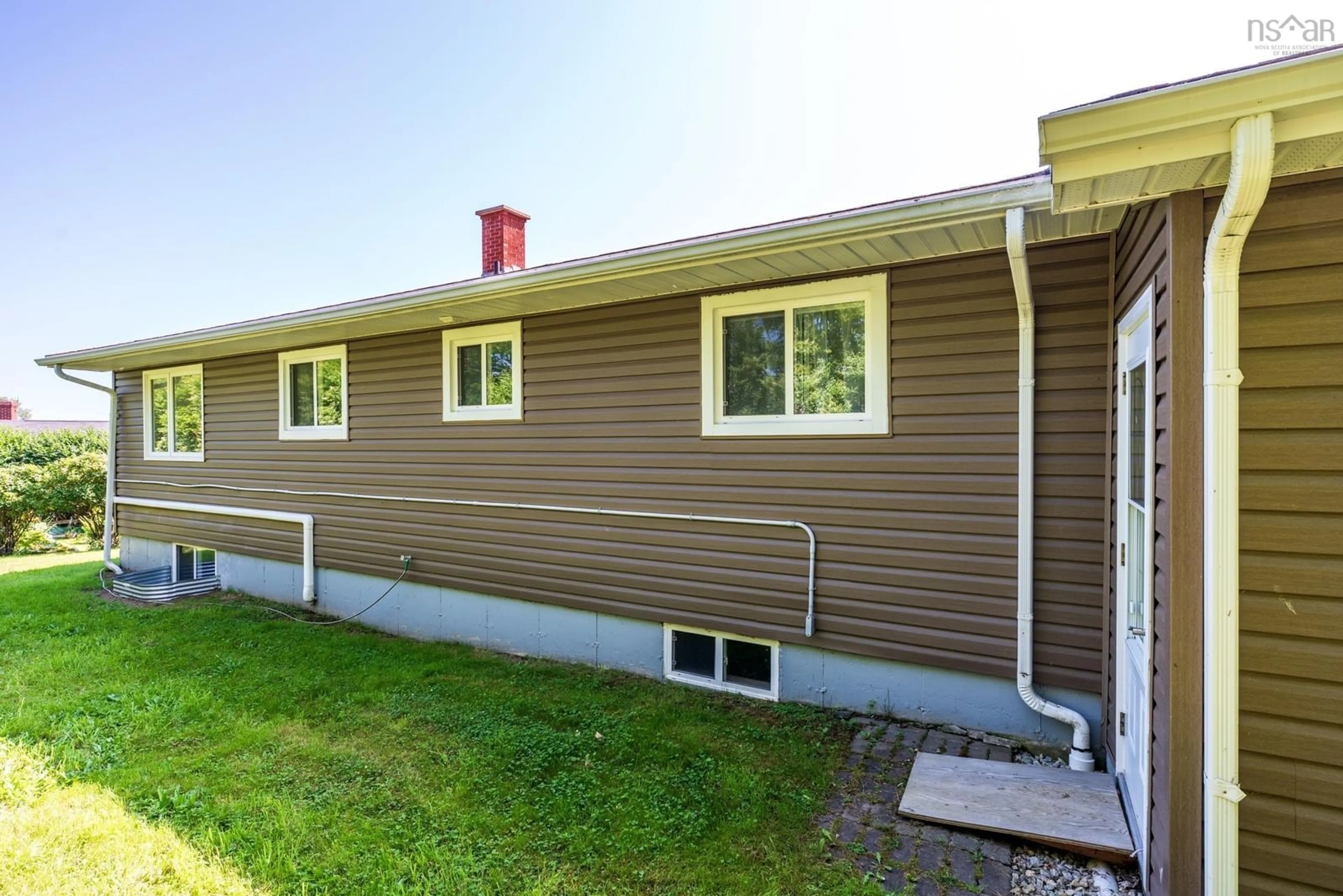 Home with vinyl exterior material, street for 35 Hector St, Port Maitland Nova Scotia B5A 5R8