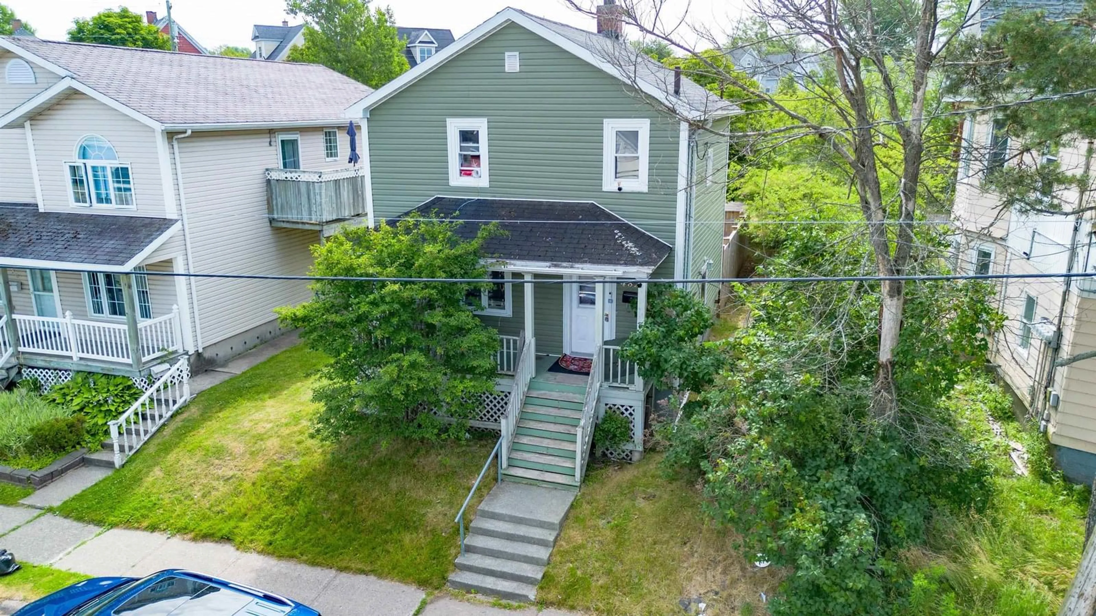 A pic from outside/outdoor area/front of a property/back of a property/a pic from drone, street for 482 Townsend Street, Sydney Nova Scotia B1P 5G6