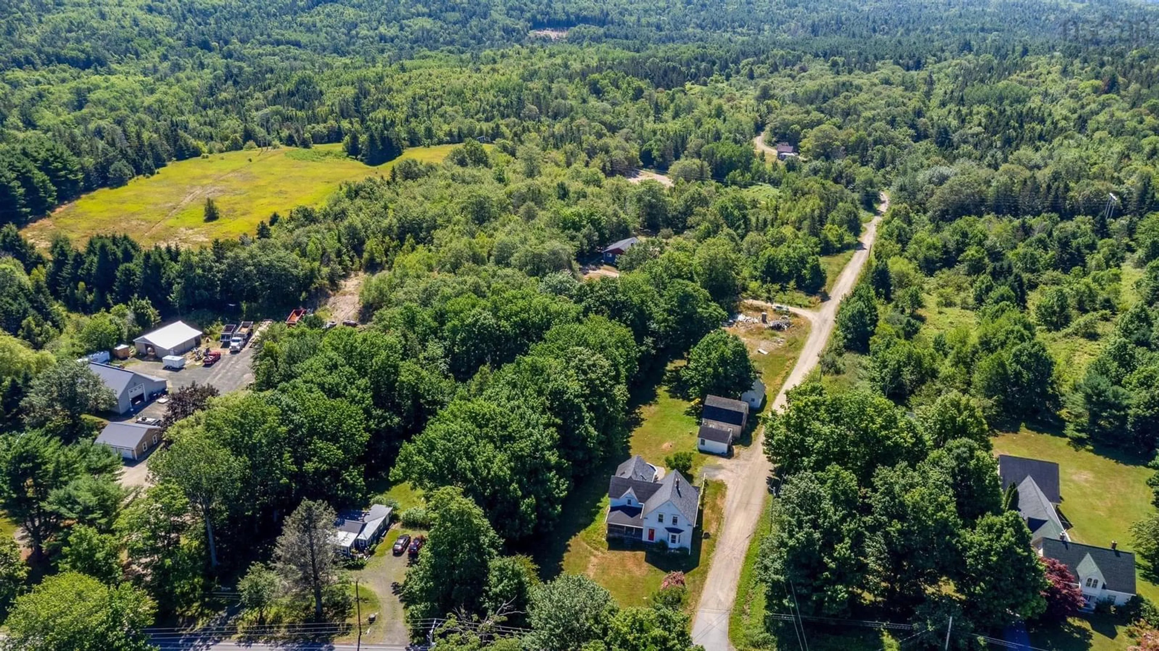 A pic from outside/outdoor area/front of a property/back of a property/a pic from drone, forest/trees view for 1726 201 Hwy, Round Hill Nova Scotia B0S 1A0