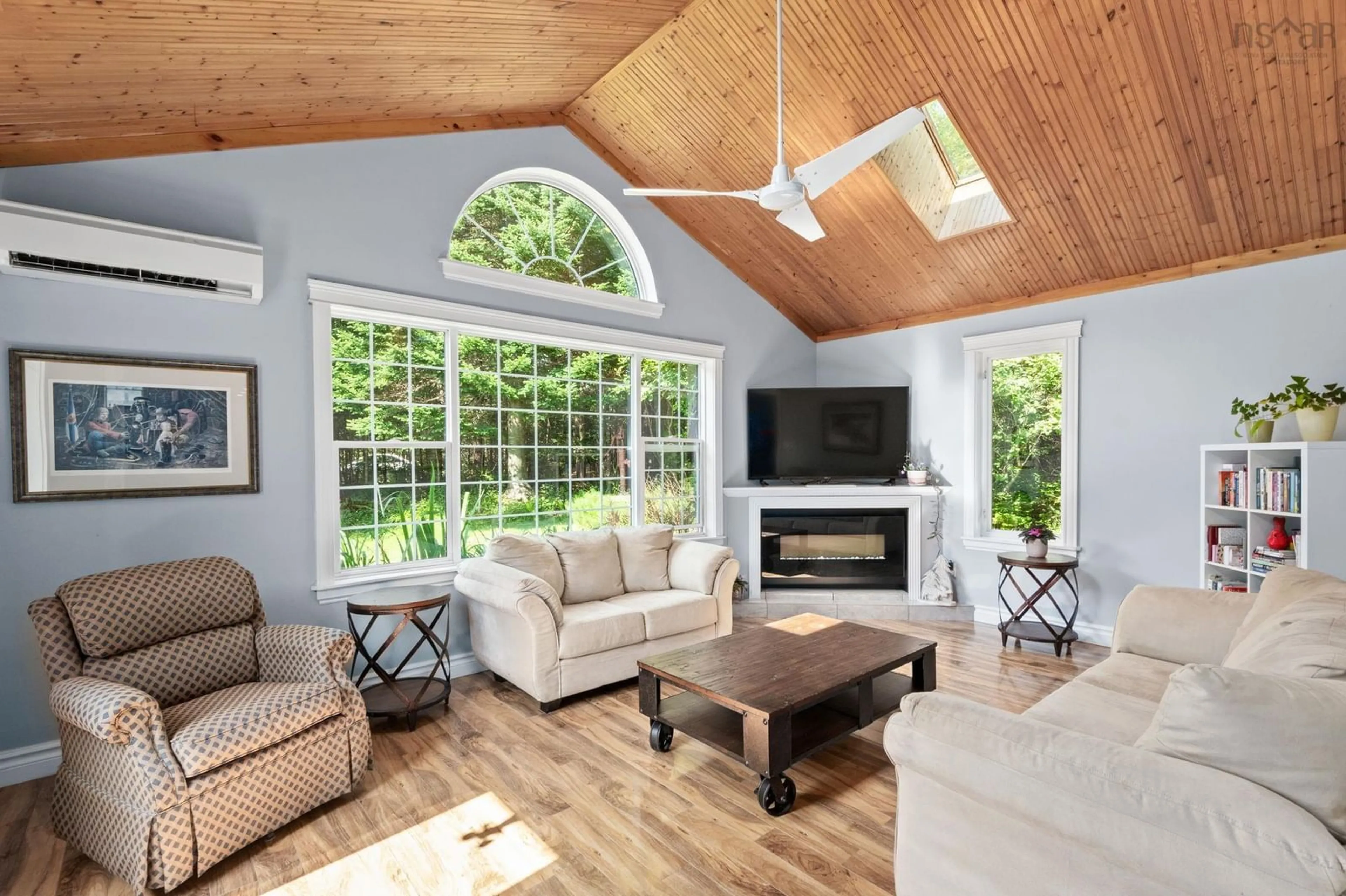 Living room with furniture, wood/laminate floor for 6 Spruce Lane, Boutiliers Point Nova Scotia B3Z 4G8