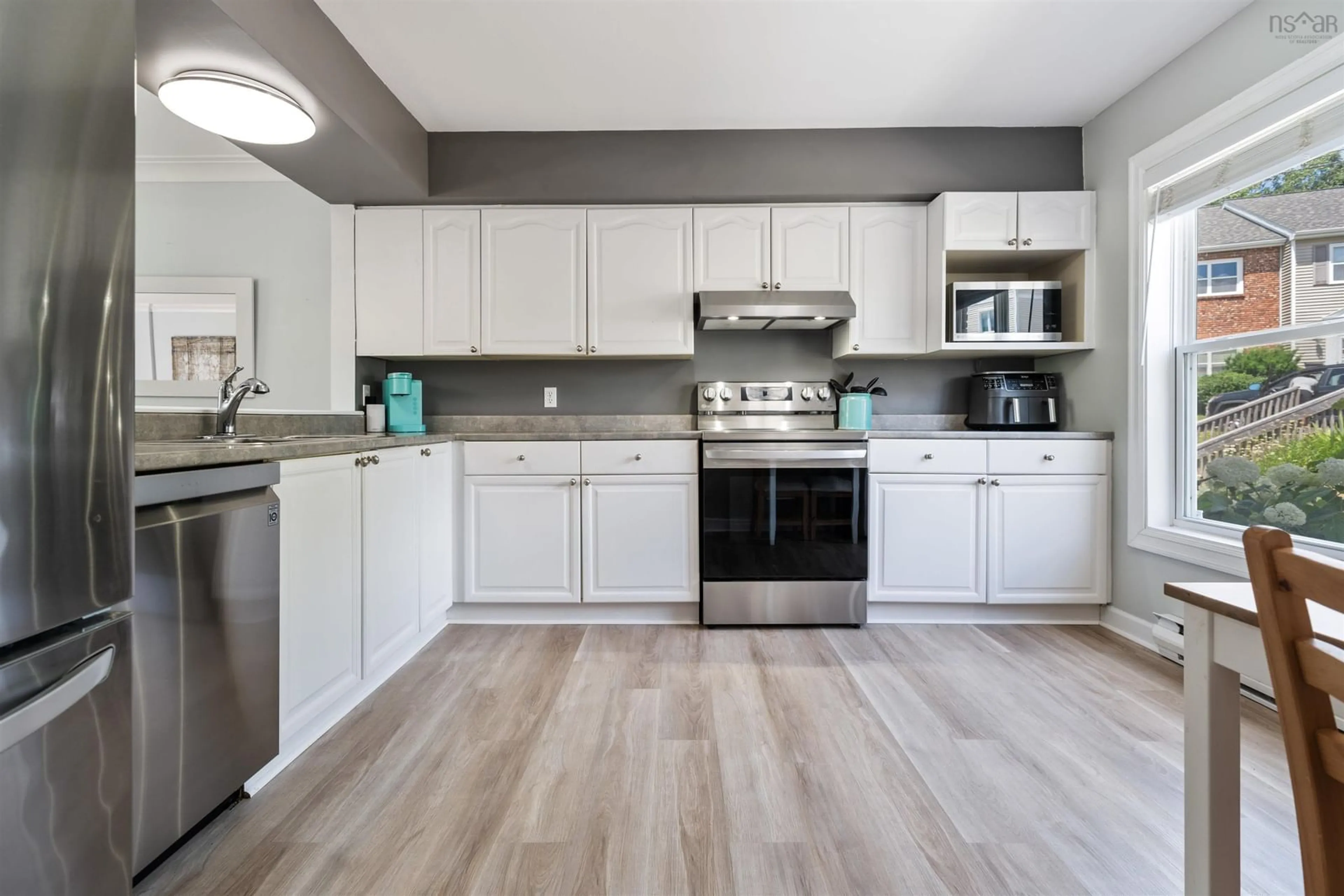 Open concept kitchen, unknown for 128 Rutledge St, Bedford Nova Scotia B4A 1X6