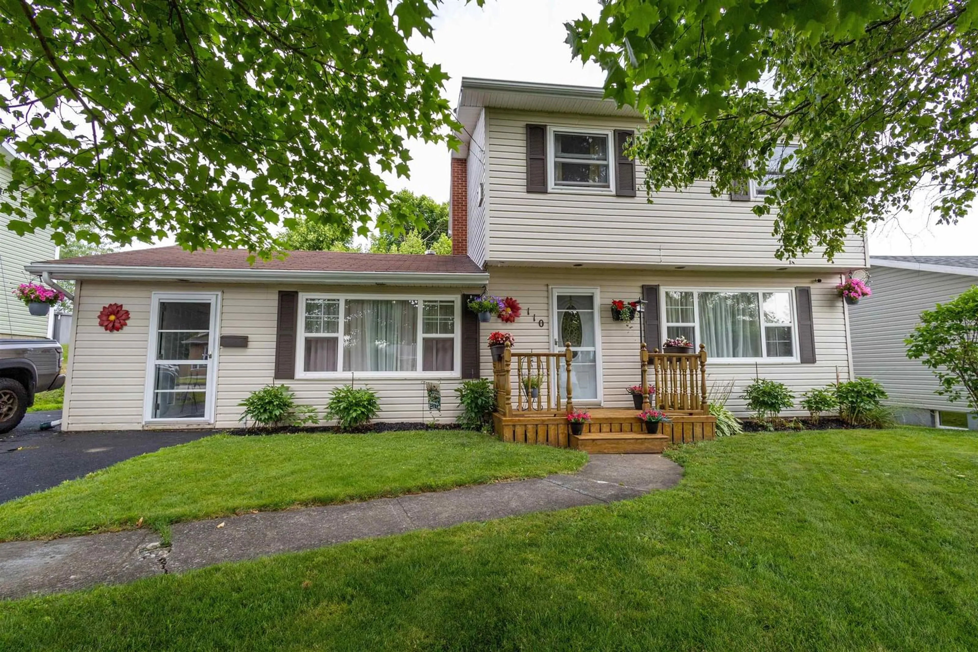 Home with vinyl exterior material, street for 110 Applecross Dr, Westmount Nova Scotia B1R 2B3