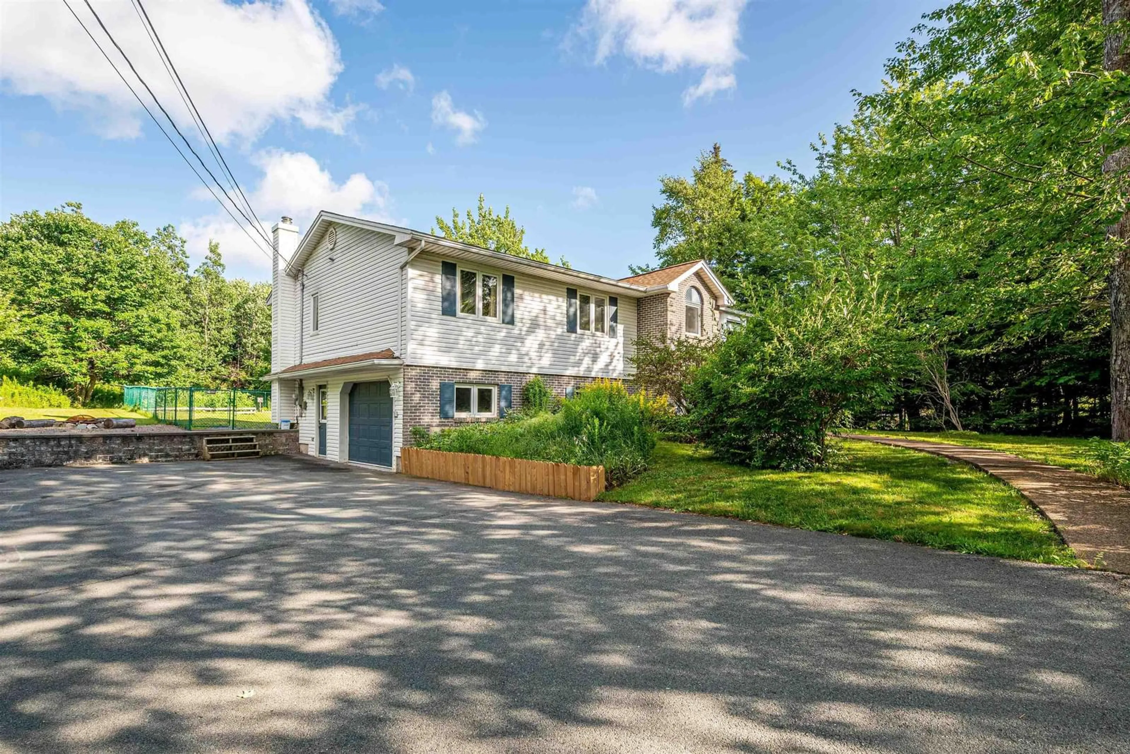 A pic from outside/outdoor area/front of a property/back of a property/a pic from drone, street for 78 Kingswood Dr, Hammonds Plains Nova Scotia B4B 1K4