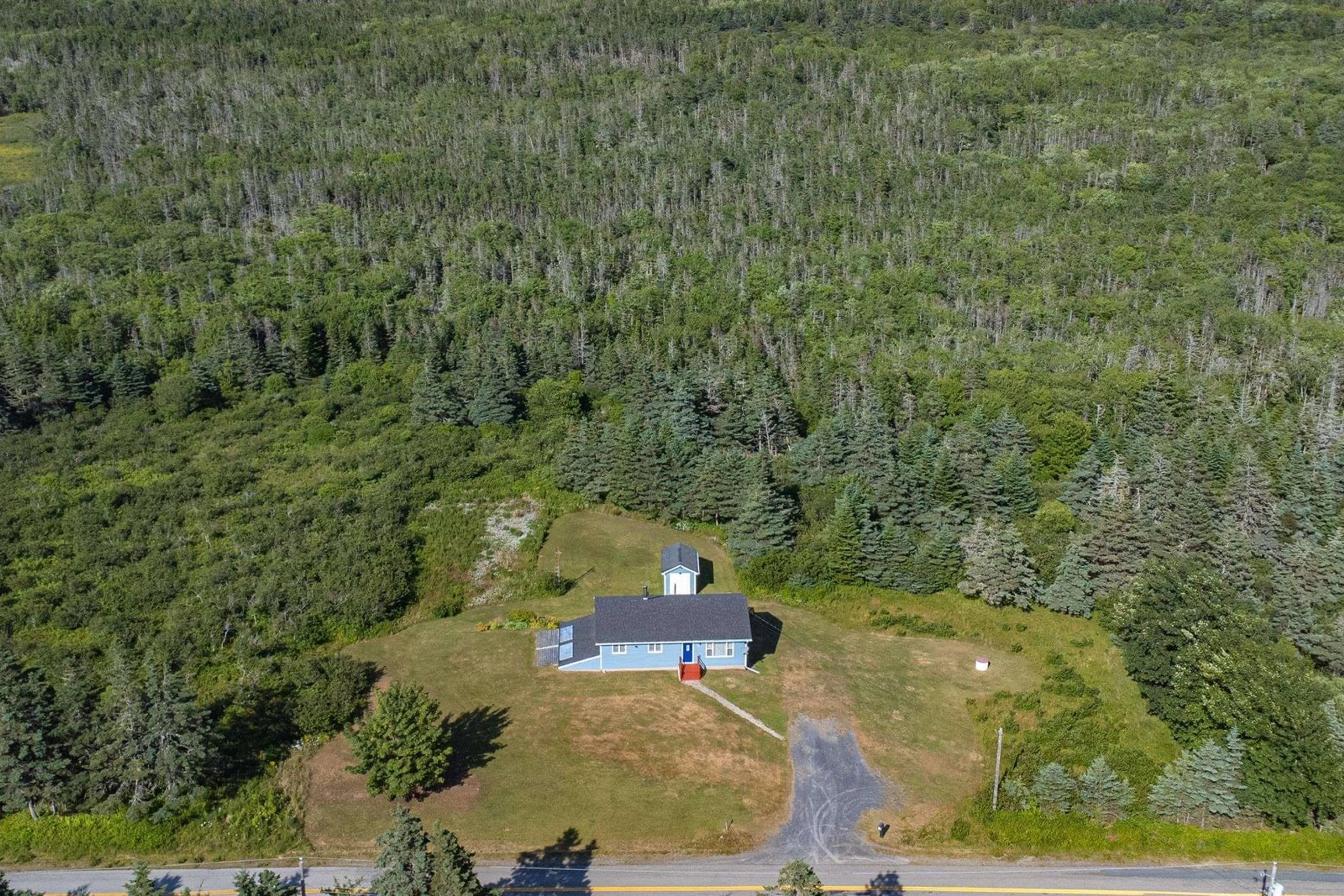 A pic from outside/outdoor area/front of a property/back of a property/a pic from drone, forest/trees view for 292 Bear Cove Rd, St. Alphonse Nova Scotia B0W 2J0
