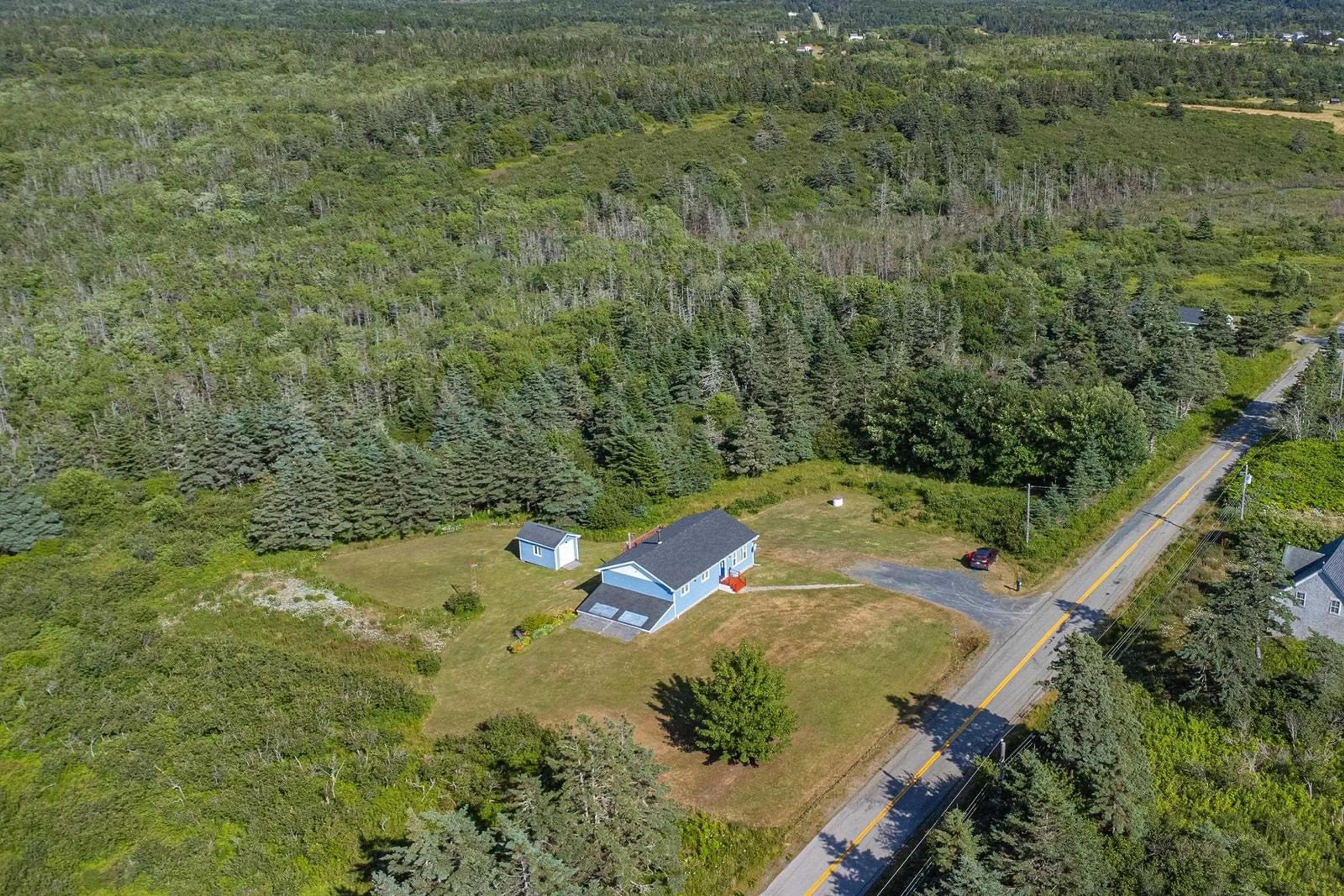 A pic from outside/outdoor area/front of a property/back of a property/a pic from drone, forest/trees view for 292 Bear Cove Rd, St. Alphonse Nova Scotia B0W 2J0