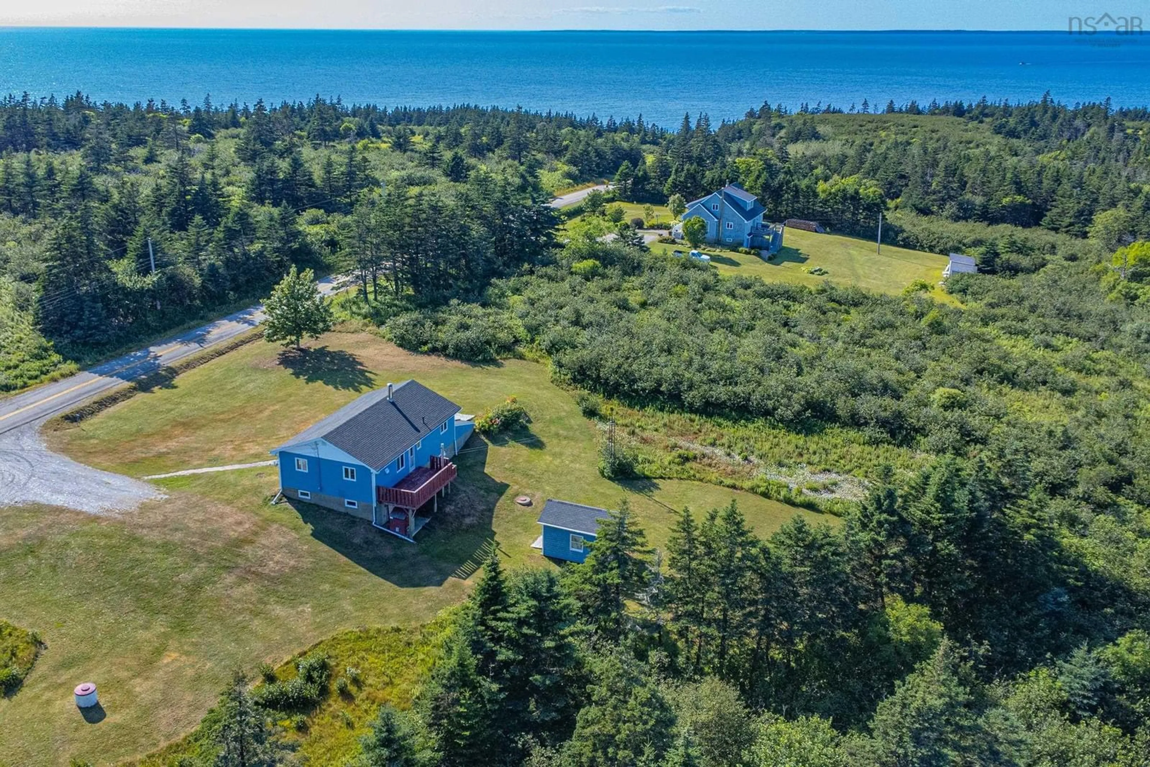 A pic from outside/outdoor area/front of a property/back of a property/a pic from drone, water/lake/river/ocean view for 292 Bear Cove Rd, St. Alphonse Nova Scotia B0W 2J0