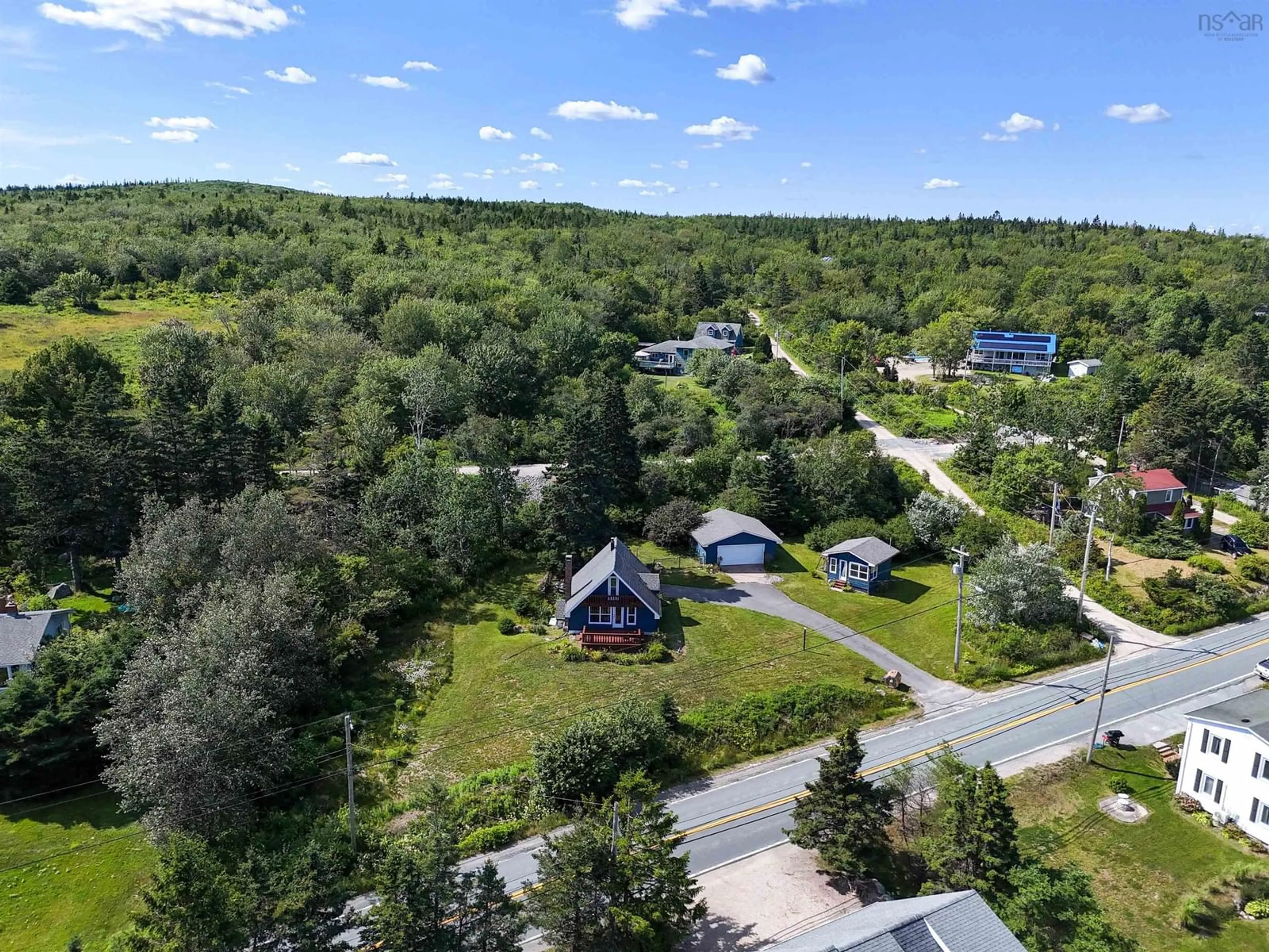 A pic from outside/outdoor area/front of a property/back of a property/a pic from drone, unknown for 9009 St Margarets Bay Rd, Queensland Nova Scotia B0J 1T0