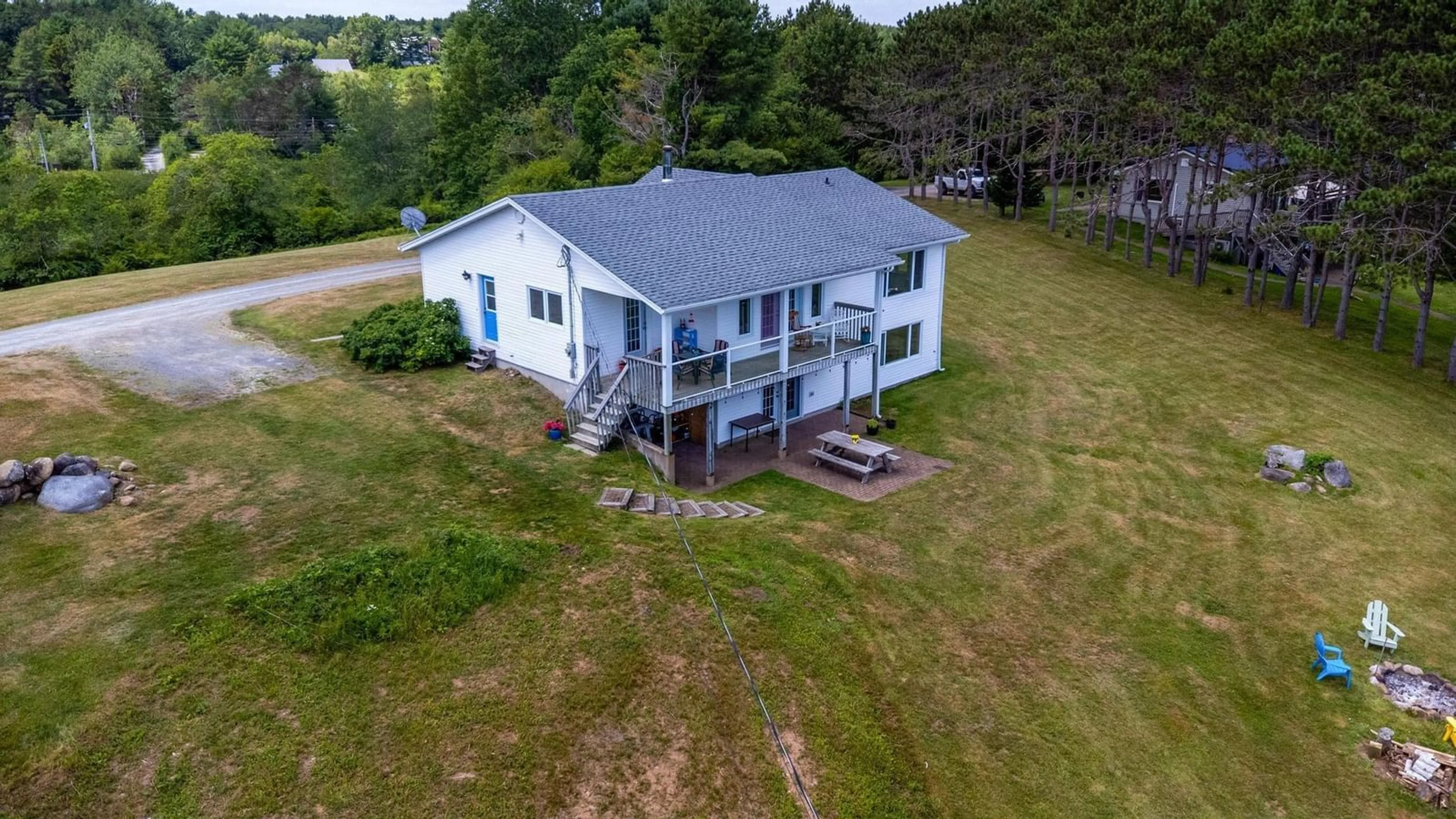 A pic from outside/outdoor area/front of a property/back of a property/a pic from drone, water/lake/river/ocean view for 37 Orchard Heights, Maders Cove Nova Scotia B0J 2C0