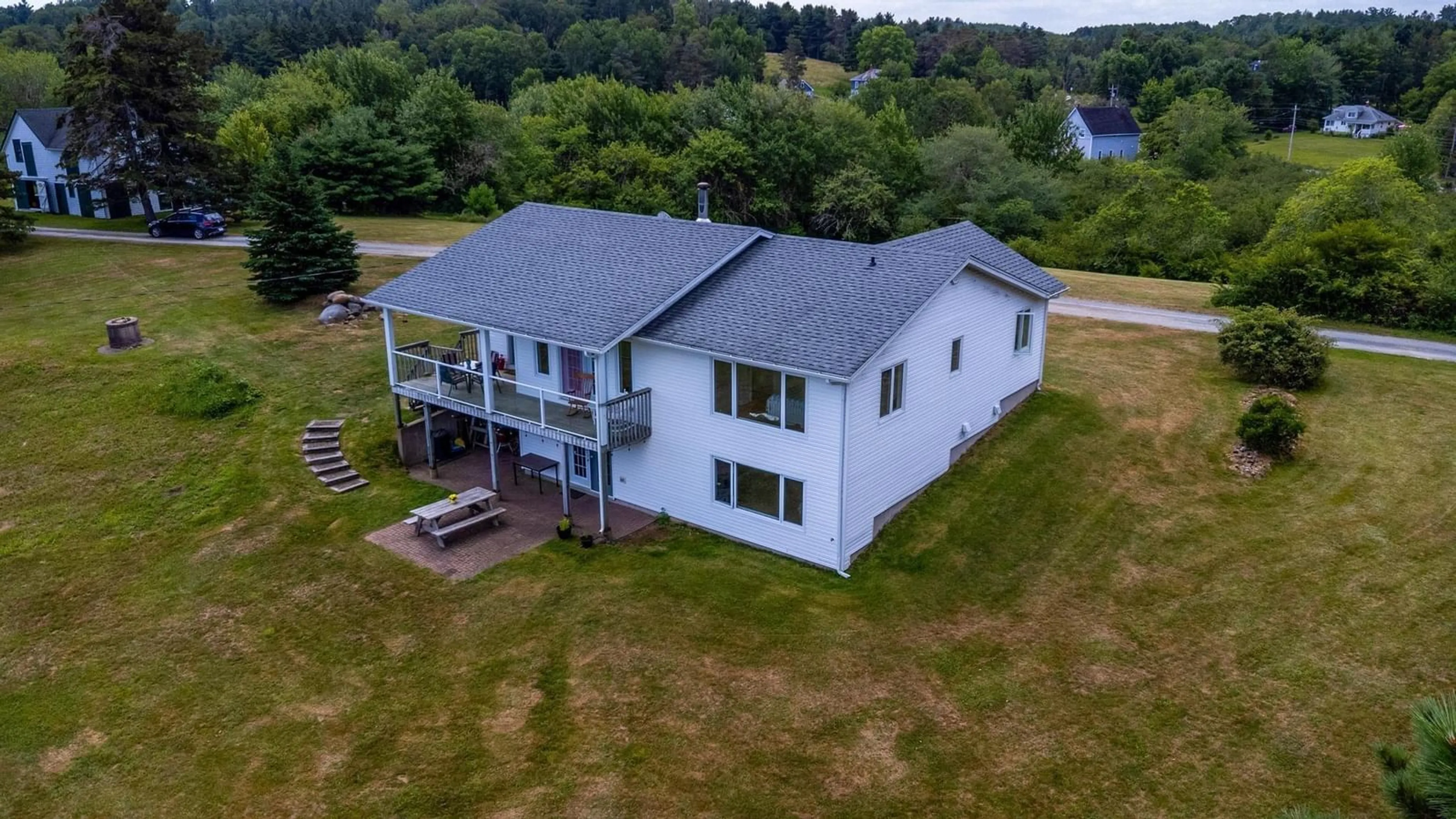 A pic from outside/outdoor area/front of a property/back of a property/a pic from drone, water/lake/river/ocean view for 37 Orchard Heights, Maders Cove Nova Scotia B0J 2C0