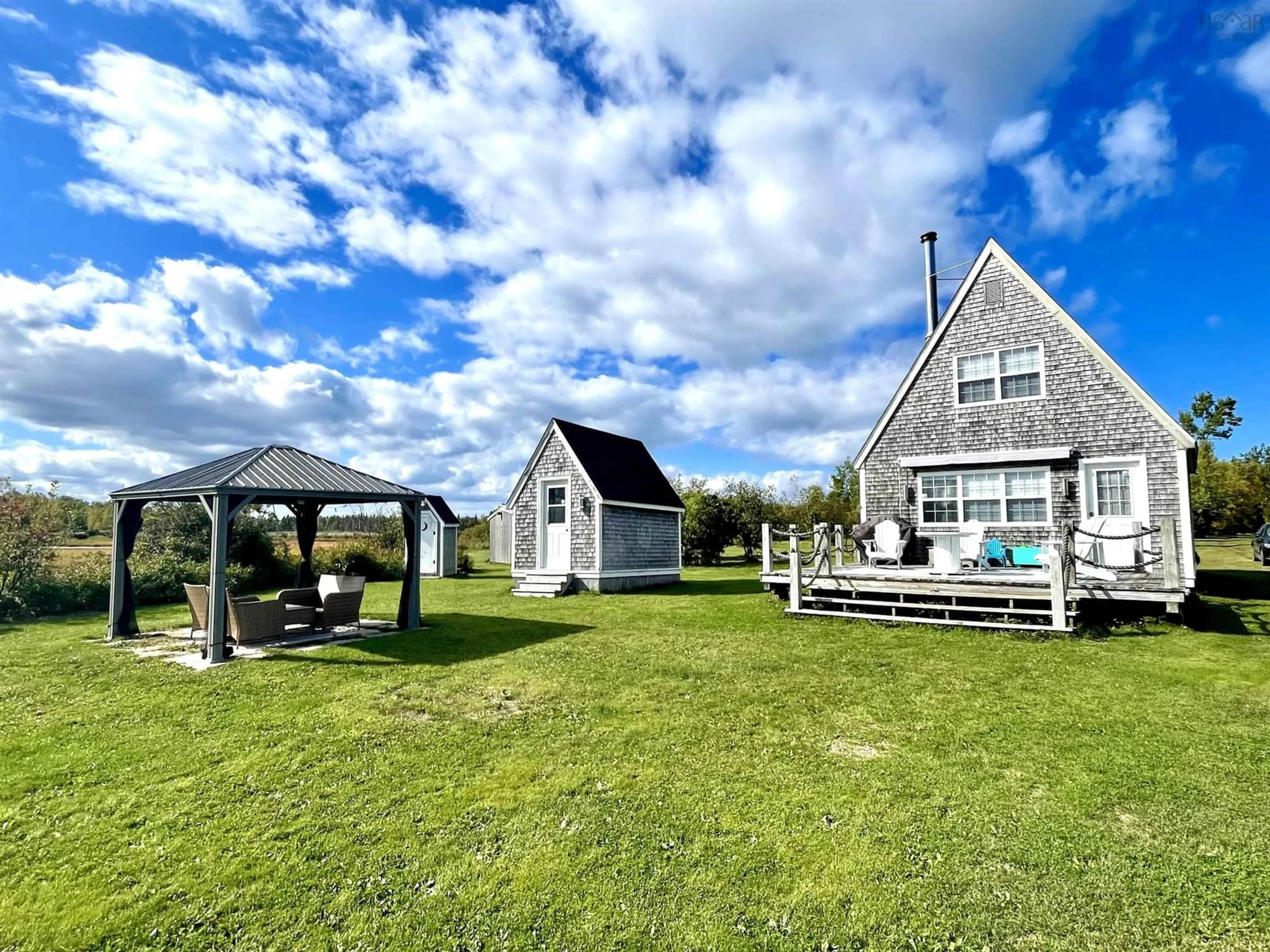 A pic from outside/outdoor area/front of a property/back of a property/a pic from drone, water/lake/river/ocean view for 4080 Malagash Rd, Malagash Point Nova Scotia B0K 1E0