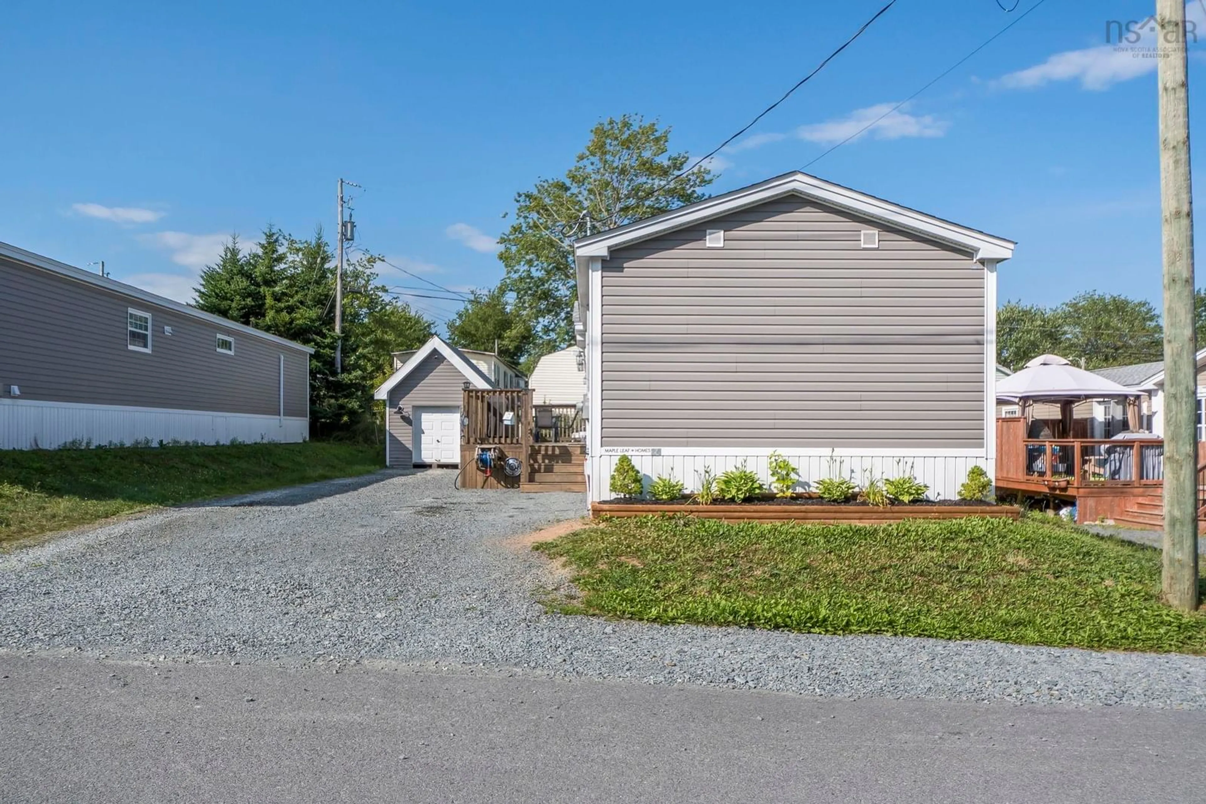Home with vinyl exterior material, street for 24 Ninth St, Lucasville Nova Scotia B4B 1R5