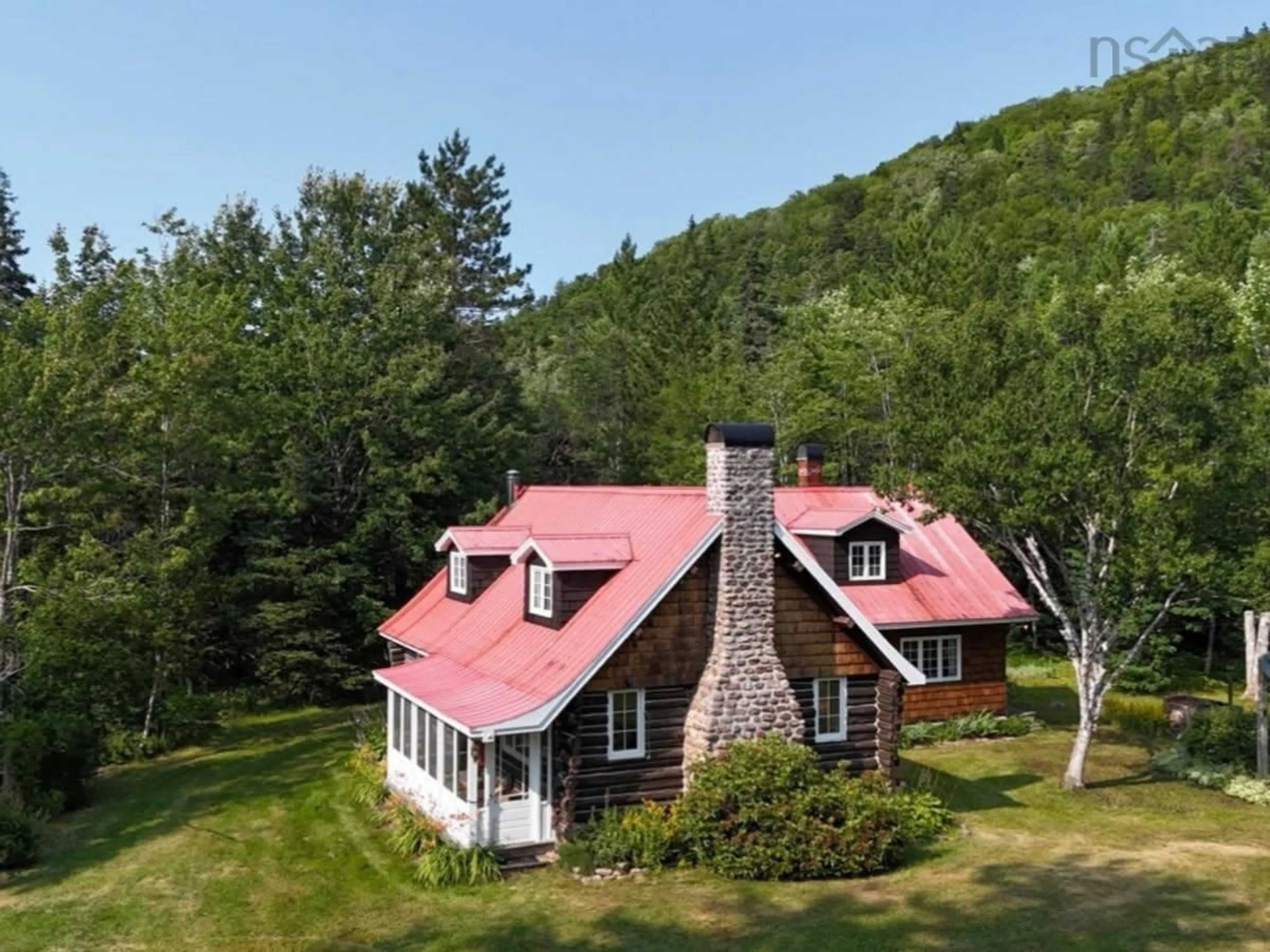 A pic from outside/outdoor area/front of a property/back of a property/a pic from drone, unknown for 3512 East Big Intervale Rd., Margaree Valley Nova Scotia B0E 2C0