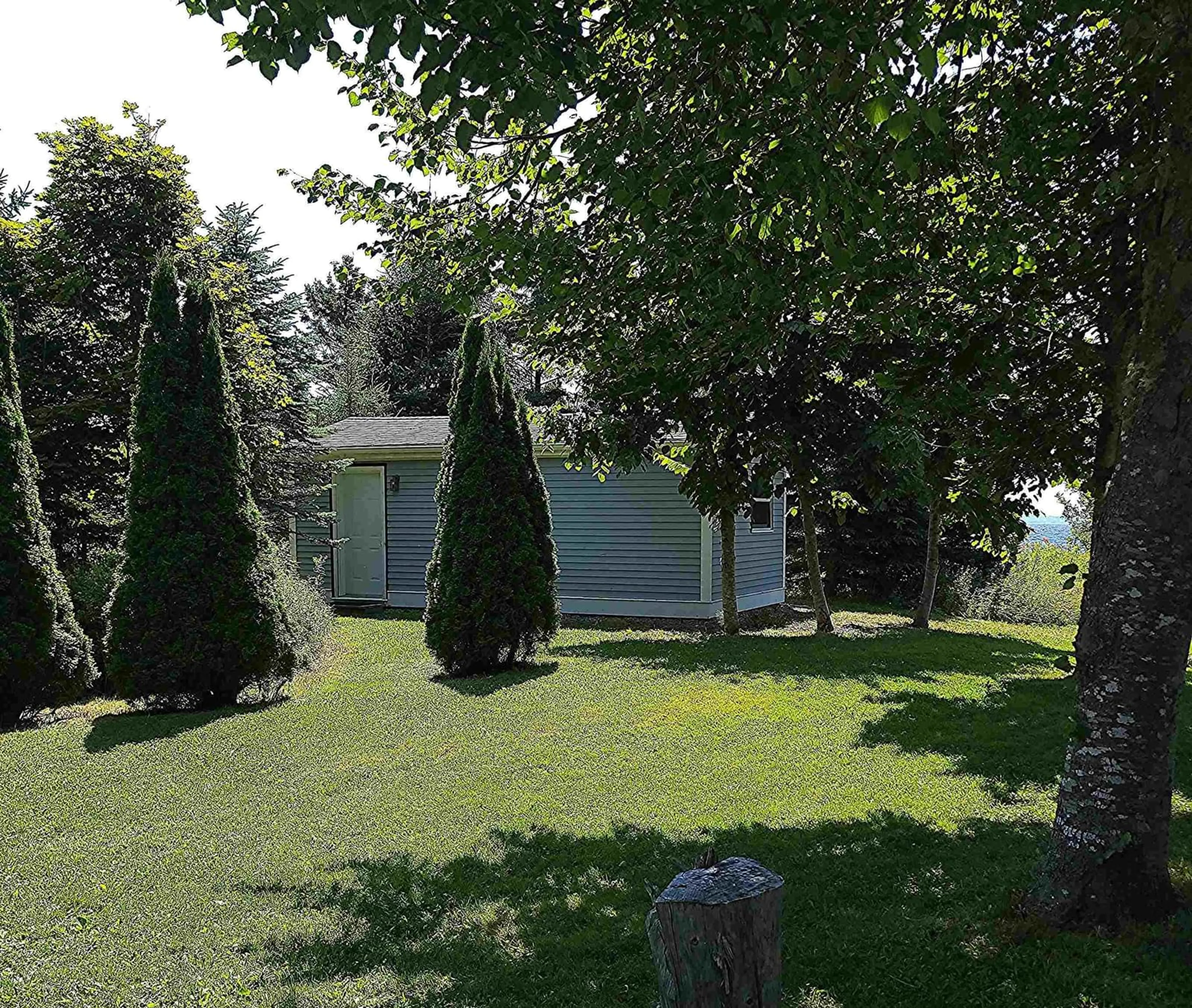 A pic from outside/outdoor area/front of a property/back of a property/a pic from drone, forest/trees view for 8518 St. Margarets Bay Rd, Black Point Nova Scotia B0J 1T0