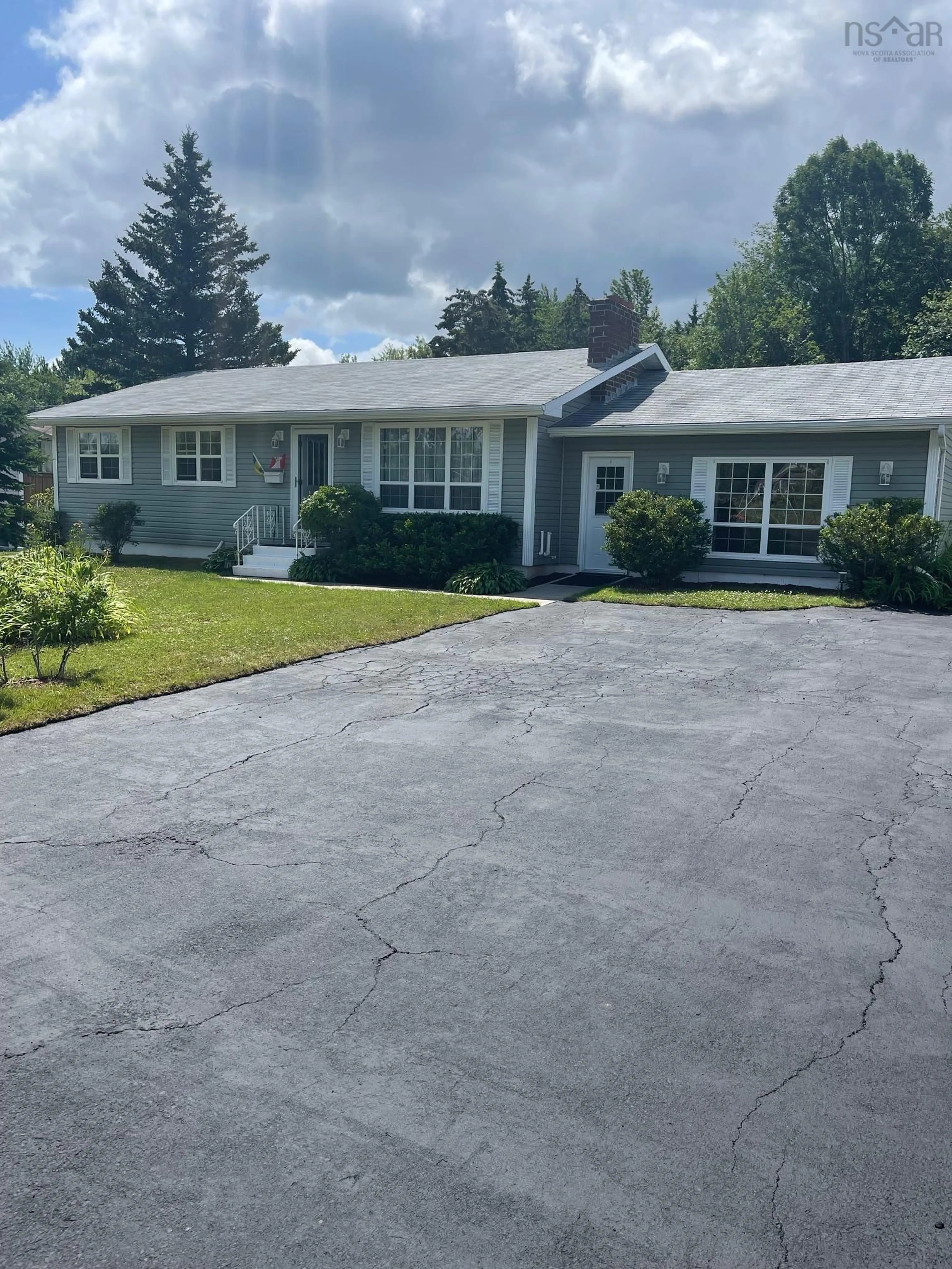 Home with vinyl exterior material, street for 75 Mackinley Dr, Coxheath Nova Scotia B1R 2E2