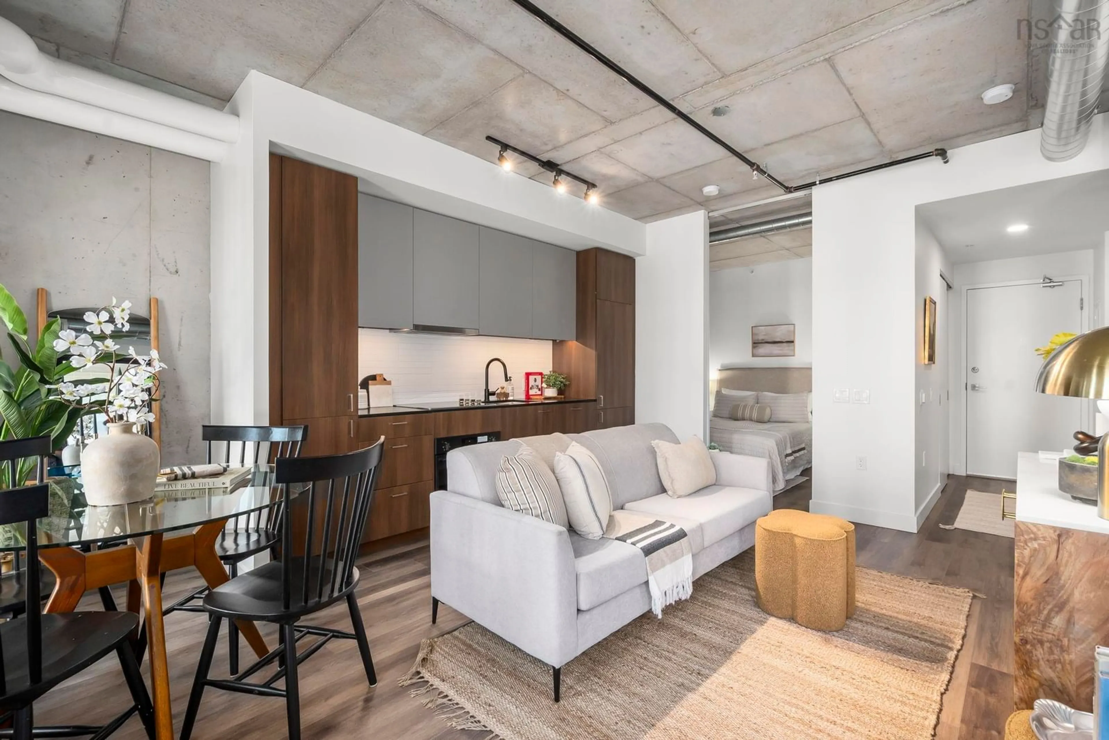 Open concept kitchen, cement floor for 5511 Bilby St #505, Halifax Nova Scotia B3K 0M5