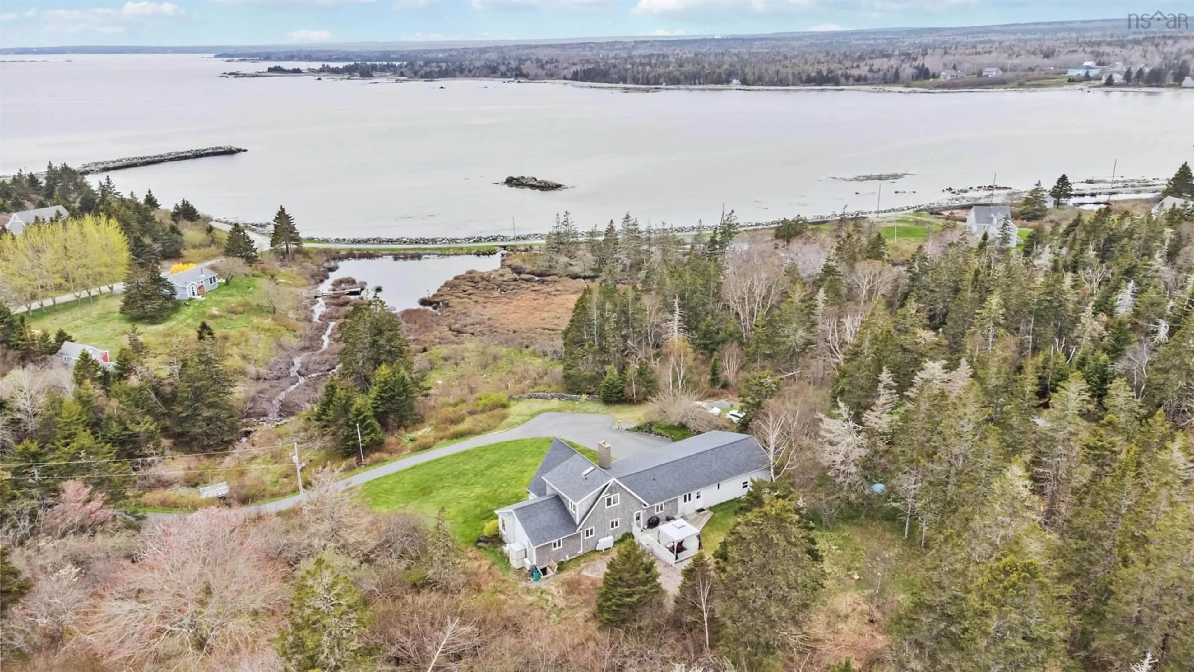 A pic from outside/outdoor area/front of a property/back of a property/a pic from drone, water/lake/river/ocean view for 78 Eagle Head Wharf Rd, Eagle Head Nova Scotia B0J 1H0