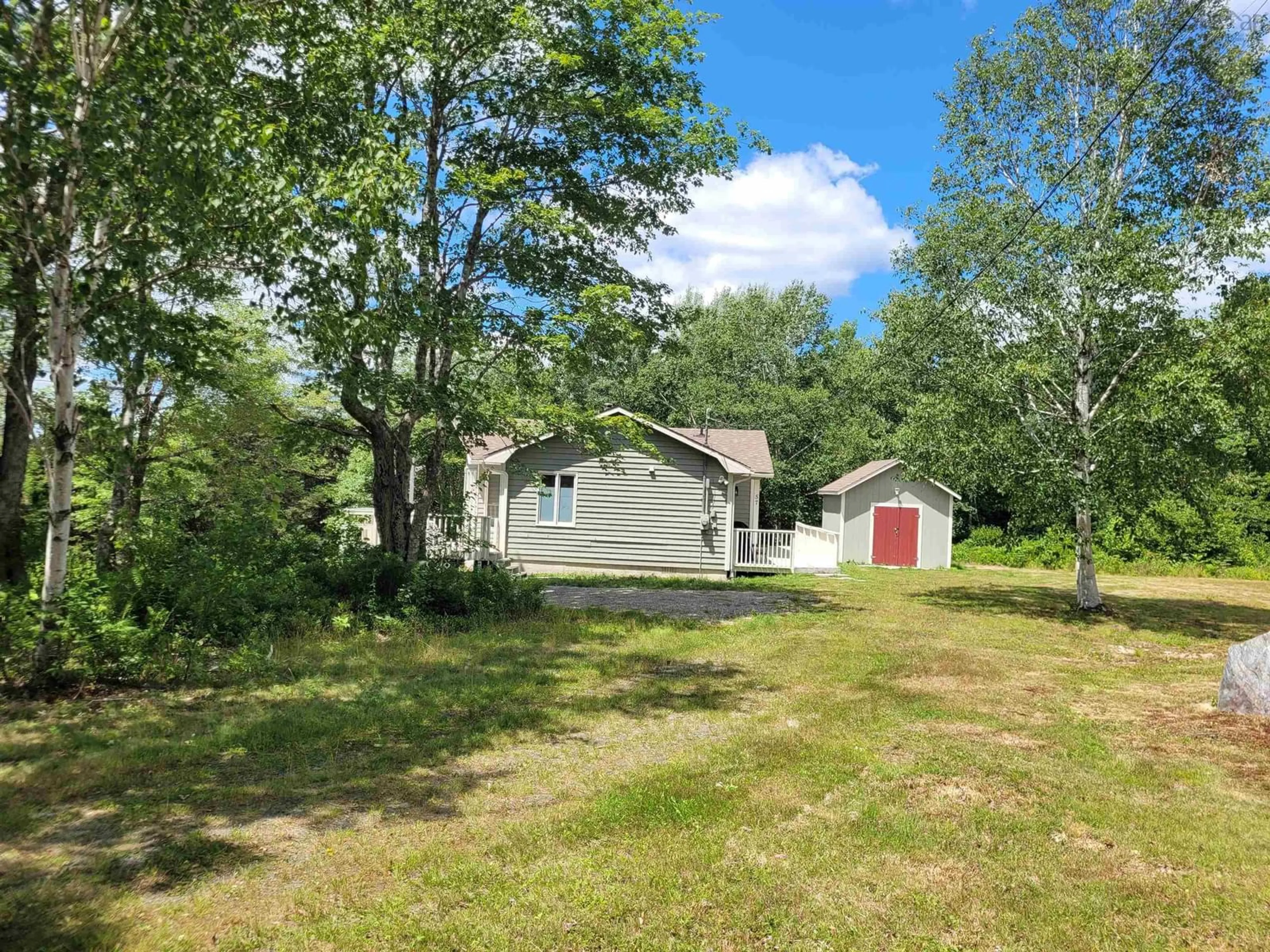 A pic from outside/outdoor area/front of a property/back of a property/a pic from drone, unknown for 57 Somerset Dr, East Sable River Nova Scotia B0T 1V0