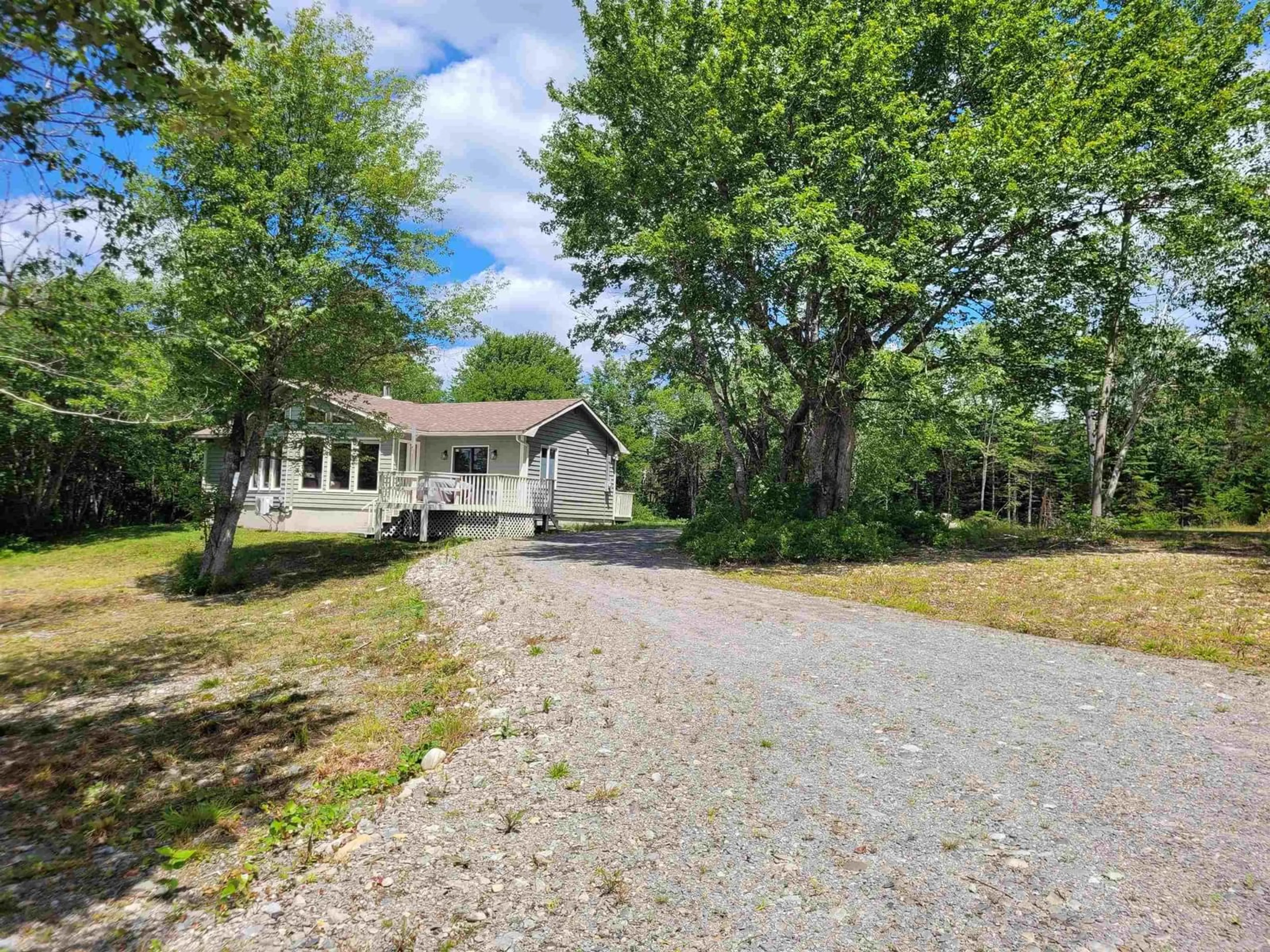 A pic from outside/outdoor area/front of a property/back of a property/a pic from drone, street for 57 Somerset Dr, East Sable River Nova Scotia B0T 1V0