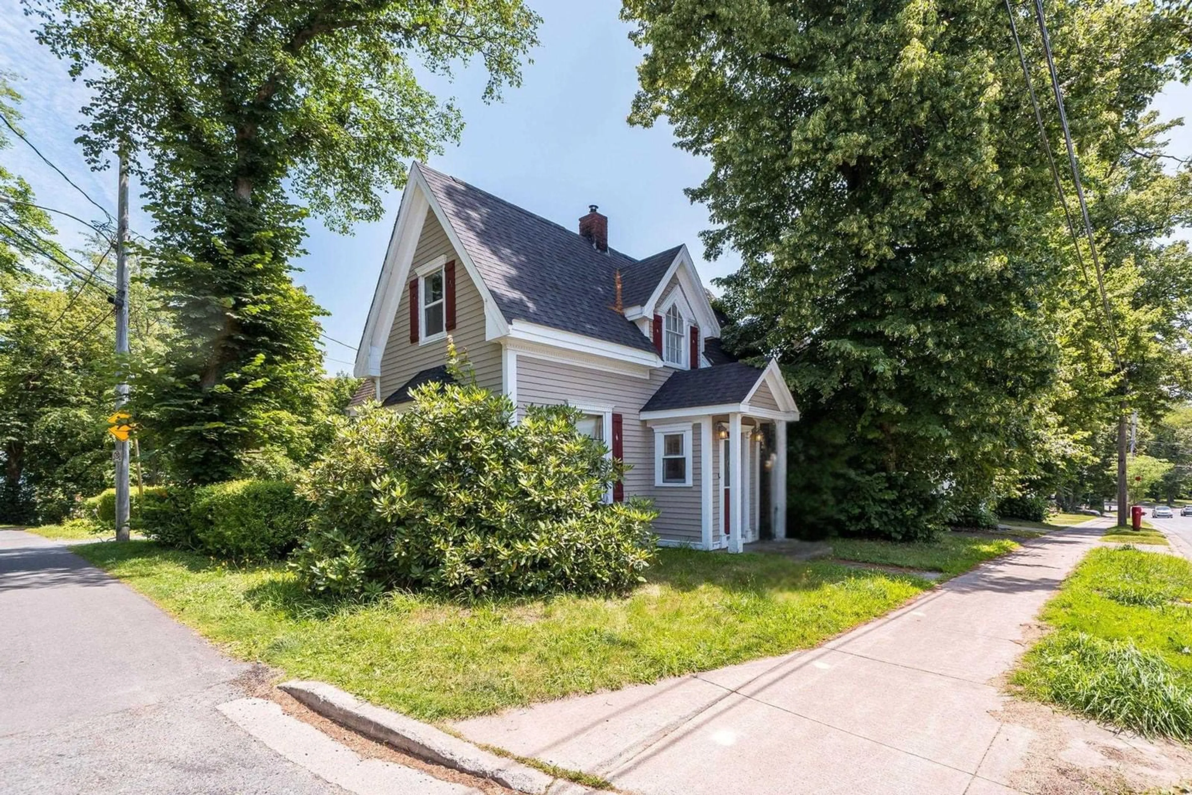 A pic from outside/outdoor area/front of a property/back of a property/a pic from drone, street for 77 Pleasant St, Dartmouth Nova Scotia B2Y 3P6