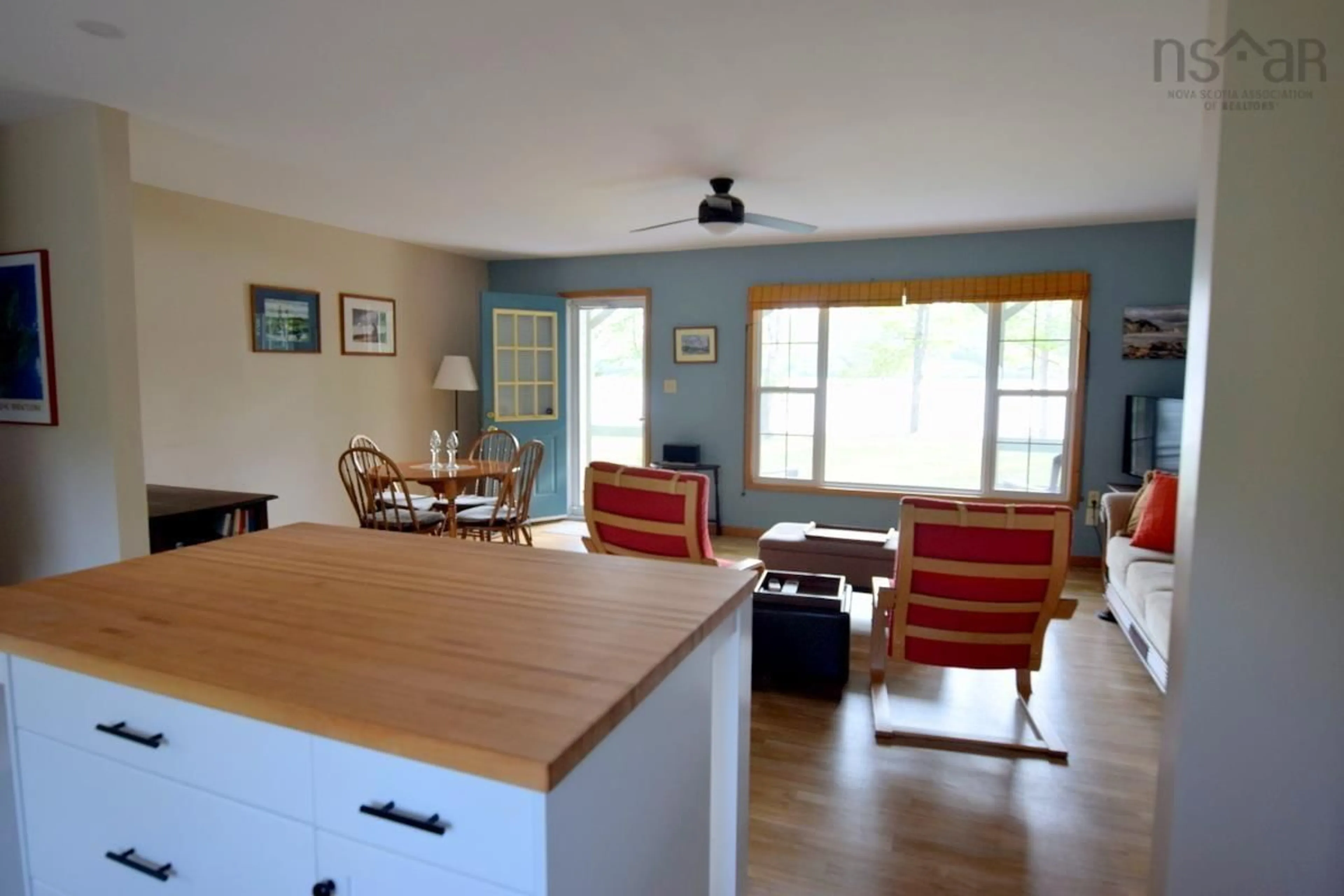 Open concept kitchen, wood/laminate floor for 1707 Highway 395, East Lake Ainslie Nova Scotia B0E 3M0