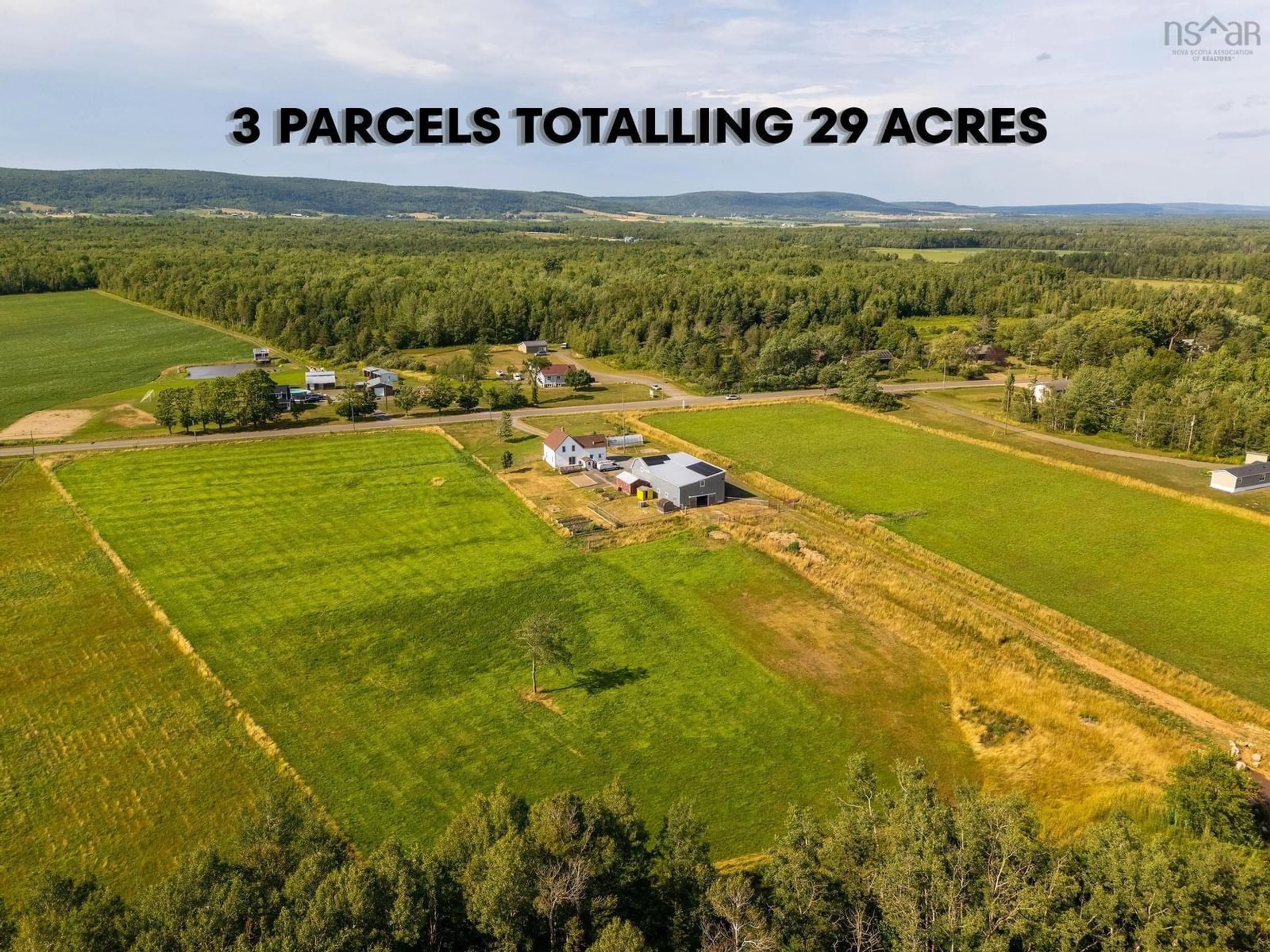 A pic from outside/outdoor area/front of a property/back of a property/a pic from drone, unknown for 710 Main Street, Lawrencetown Nova Scotia B0S 1M0