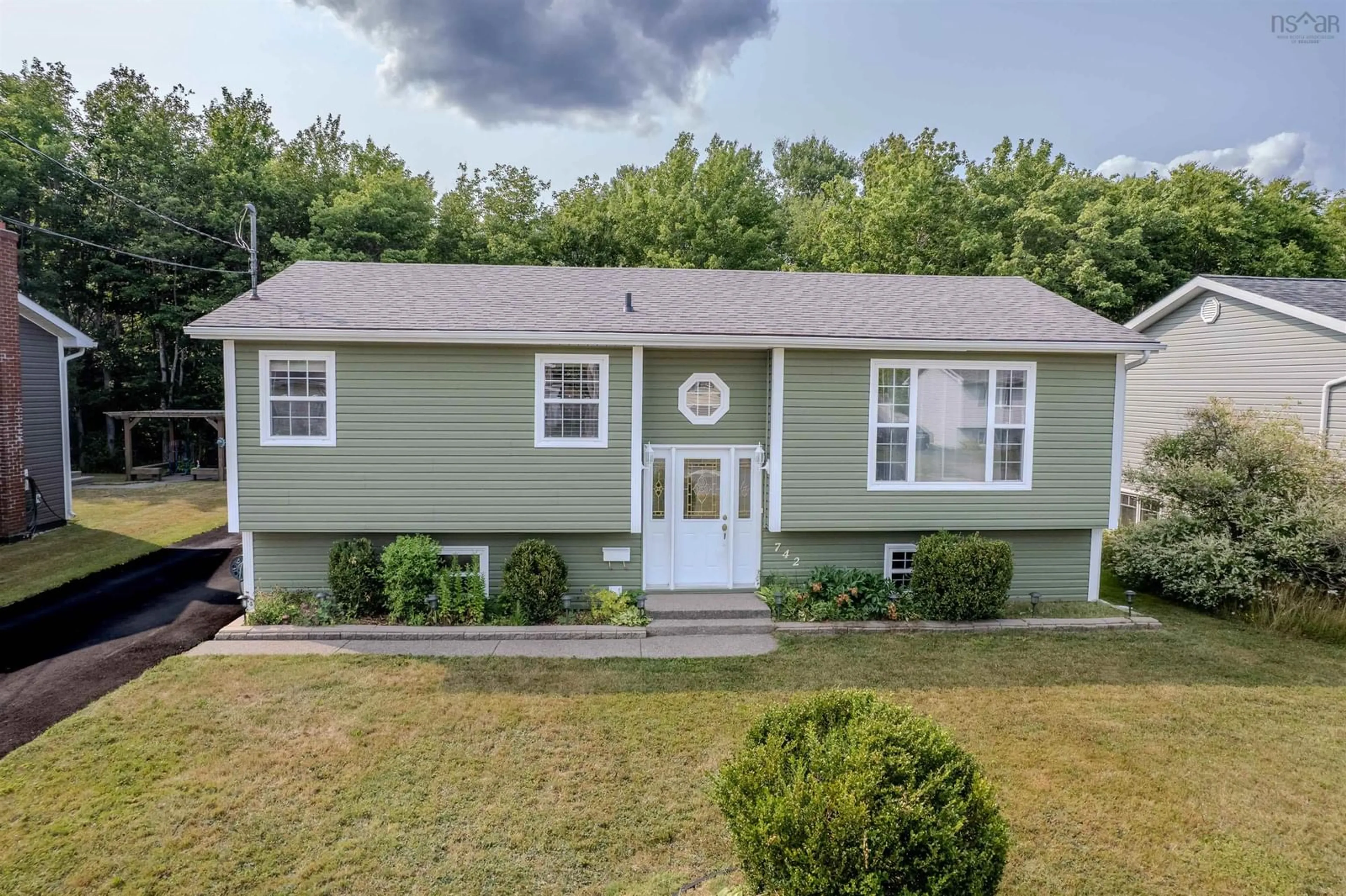 Home with vinyl exterior material, street for 742 Cottage Rd, Sydney Nova Scotia B1P 6S6
