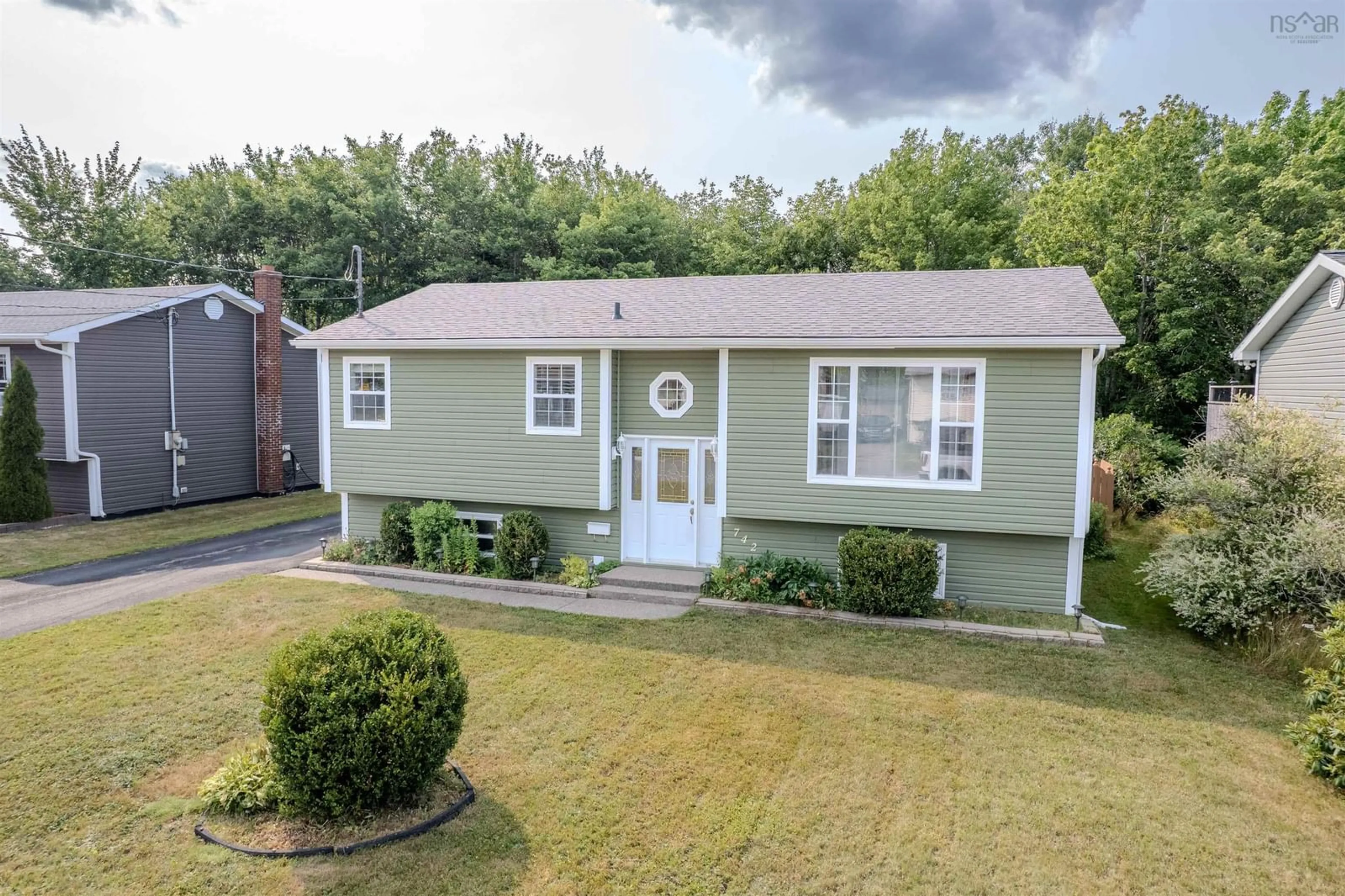 Home with vinyl exterior material, street for 742 Cottage Rd, Sydney Nova Scotia B1P 6S6