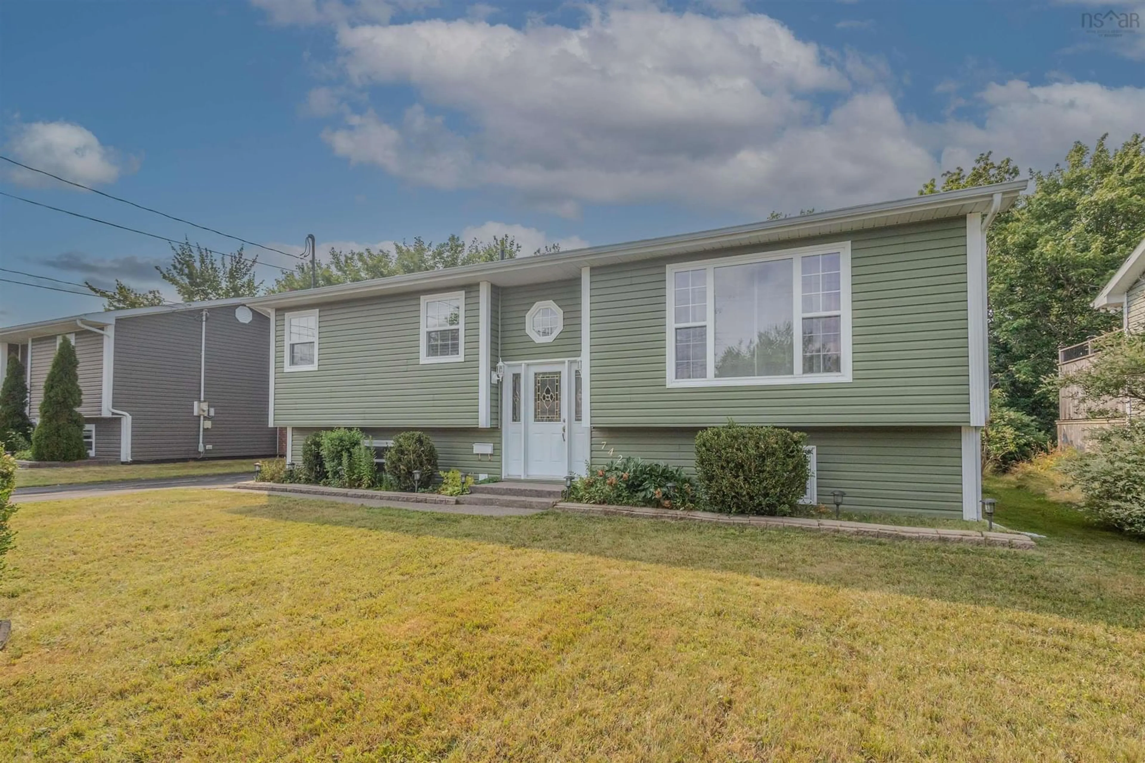 Home with vinyl exterior material, street for 742 Cottage Rd, Sydney Nova Scotia B1P 6S6