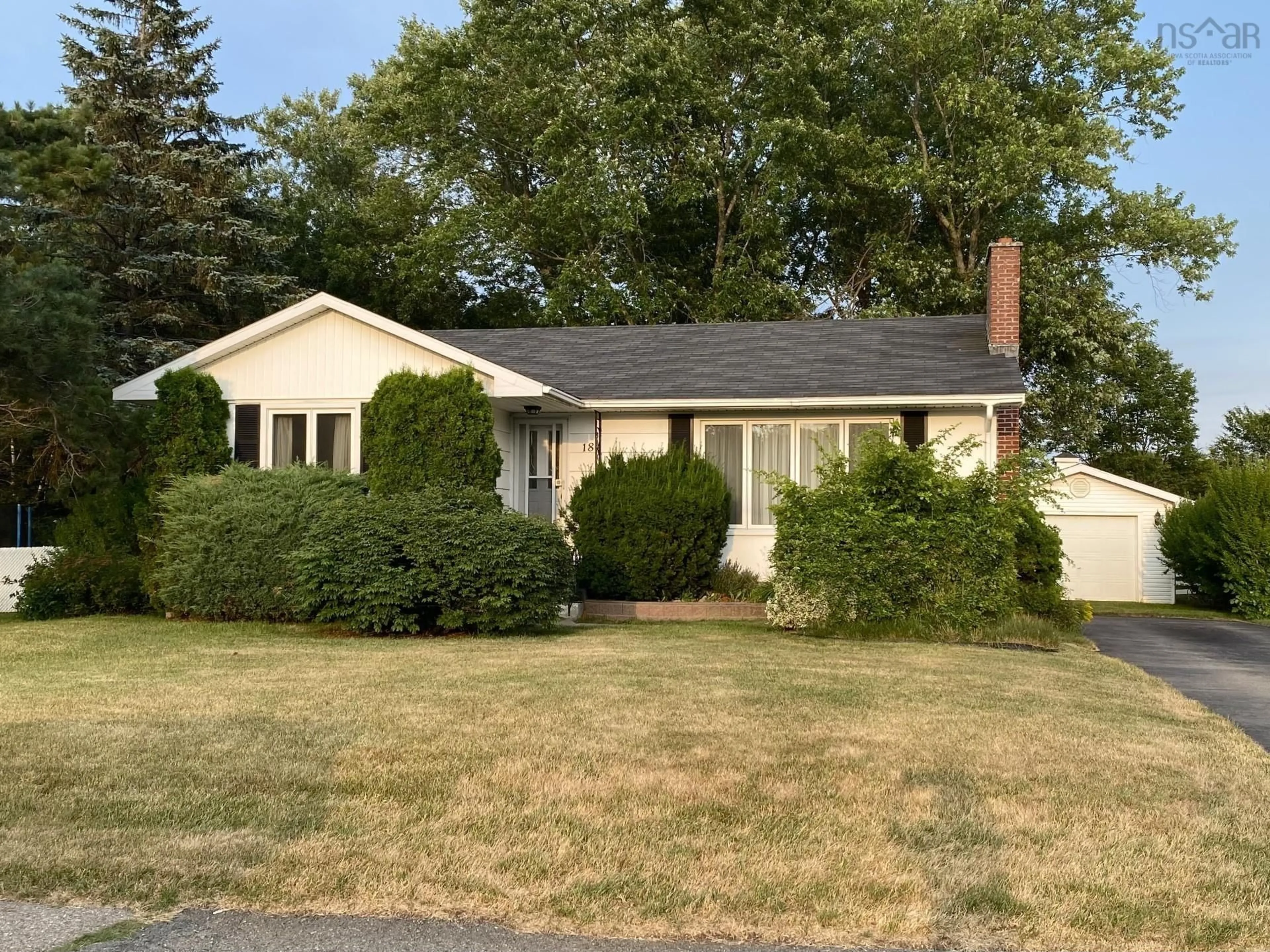Home with vinyl exterior material, street for 18 Wilkie Dr, North Sydney Nova Scotia B2A 1Y4