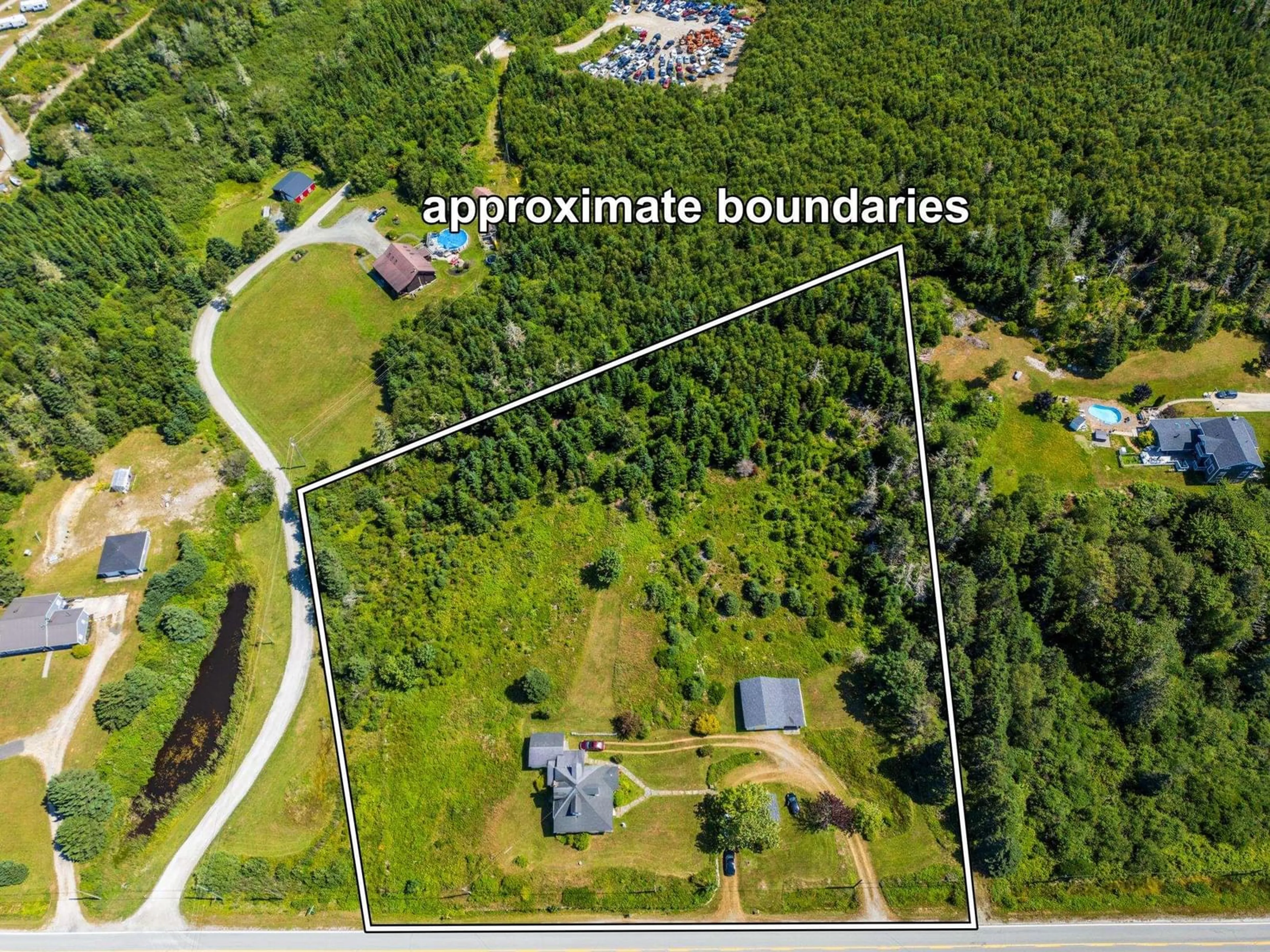 A pic from outside/outdoor area/front of a property/back of a property/a pic from drone, unknown for 2504 Highway 1, Darlings Lake Nova Scotia B5A 4A5